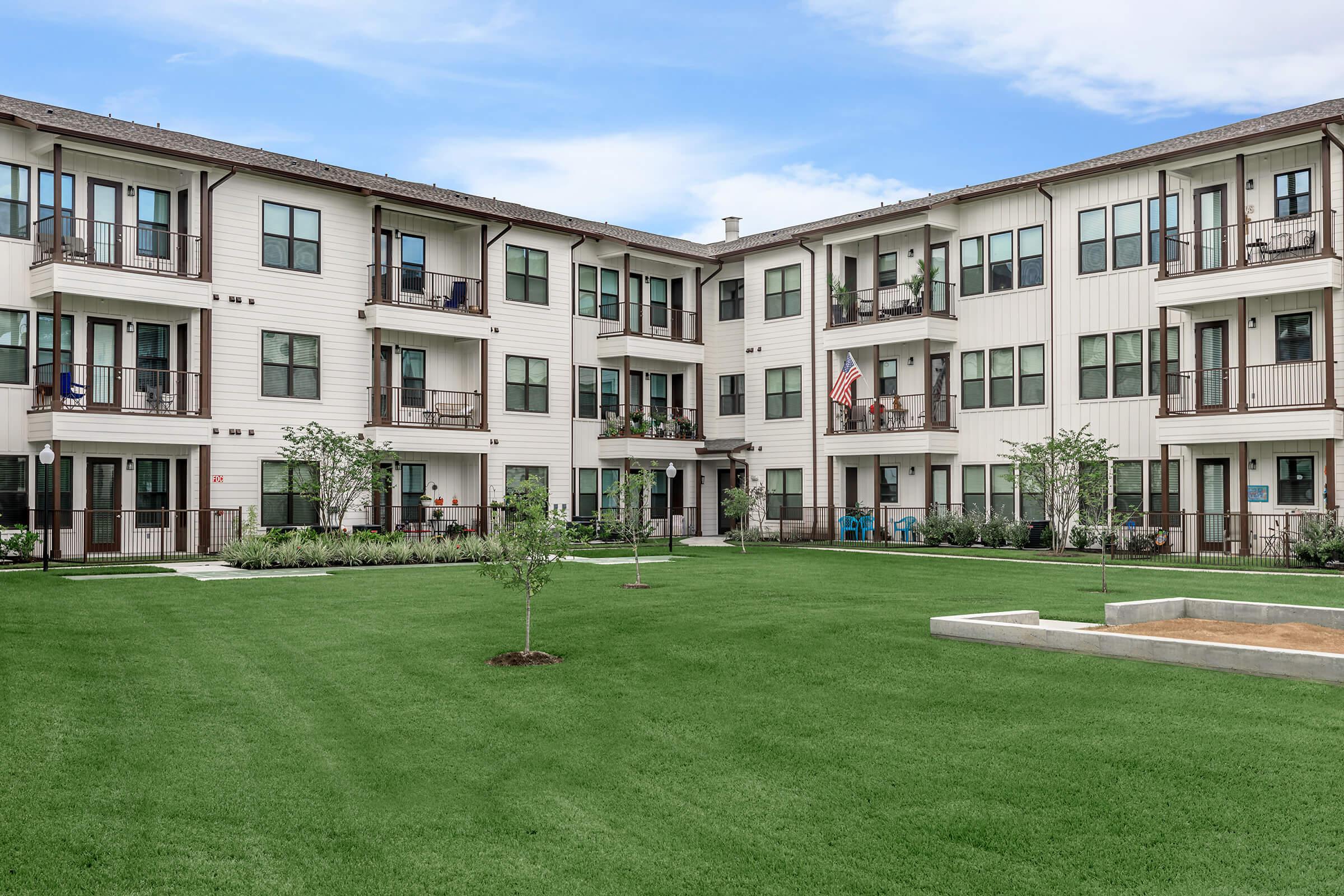 a large lawn in front of a house