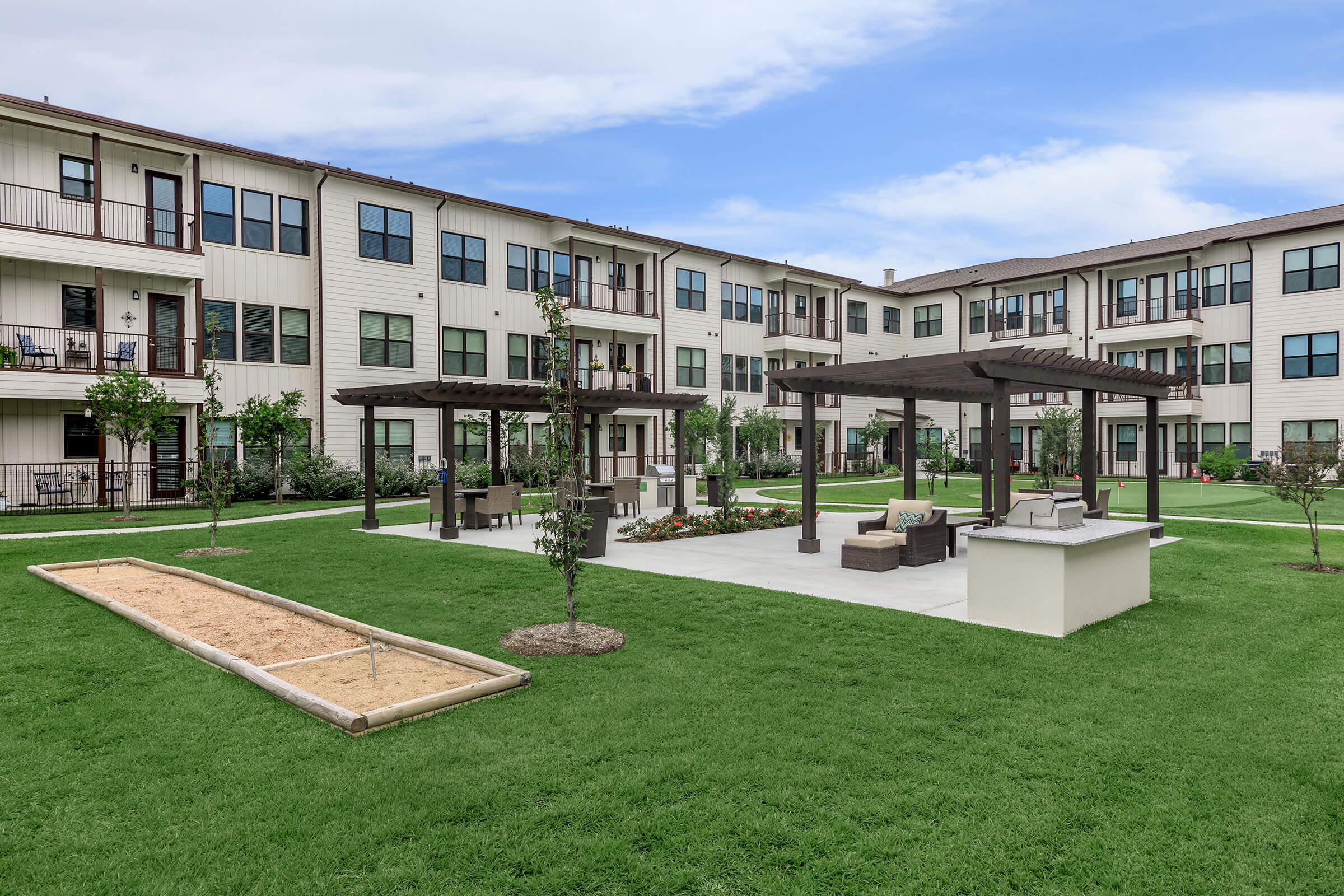 a large lawn in front of a building