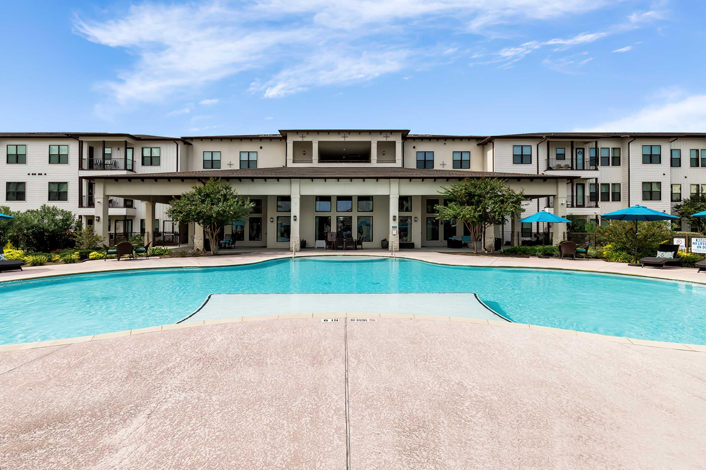 a pool next to a body of water