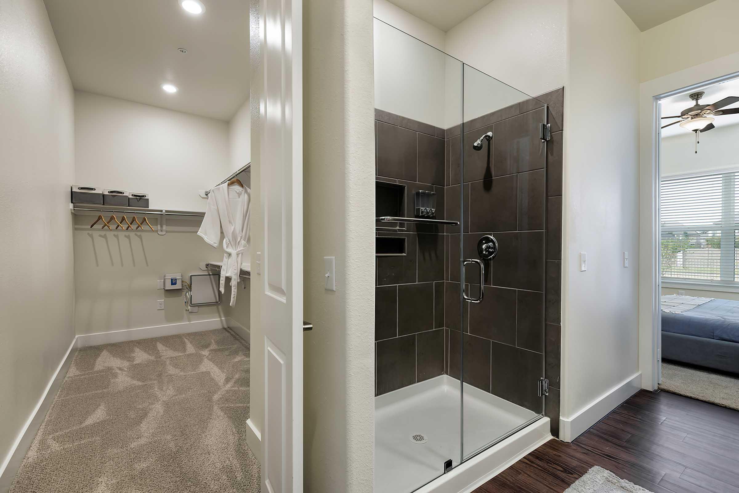 a room with a sink and a shower