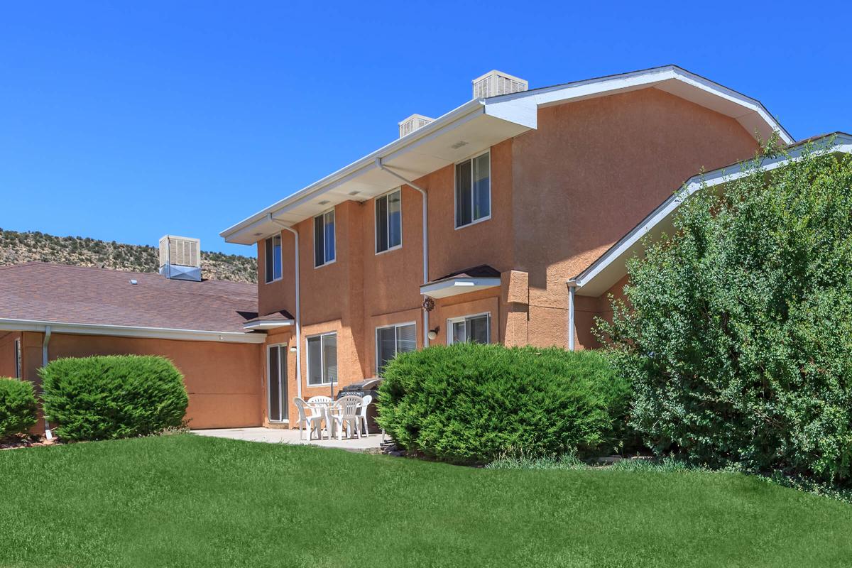 a large lawn in front of a house