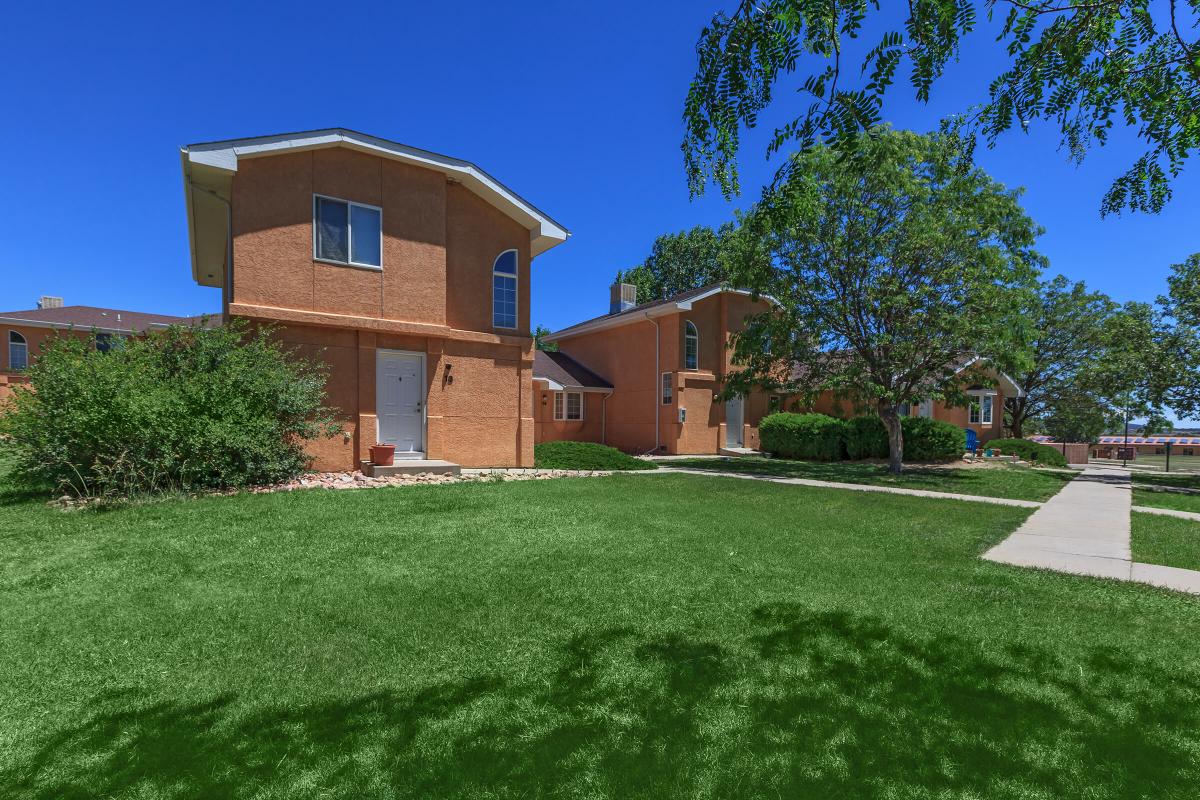 a large lawn in front of a house