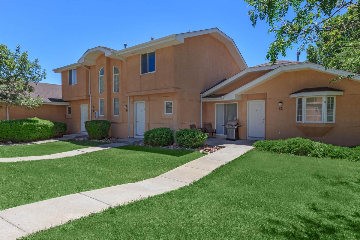 a large lawn in front of a house