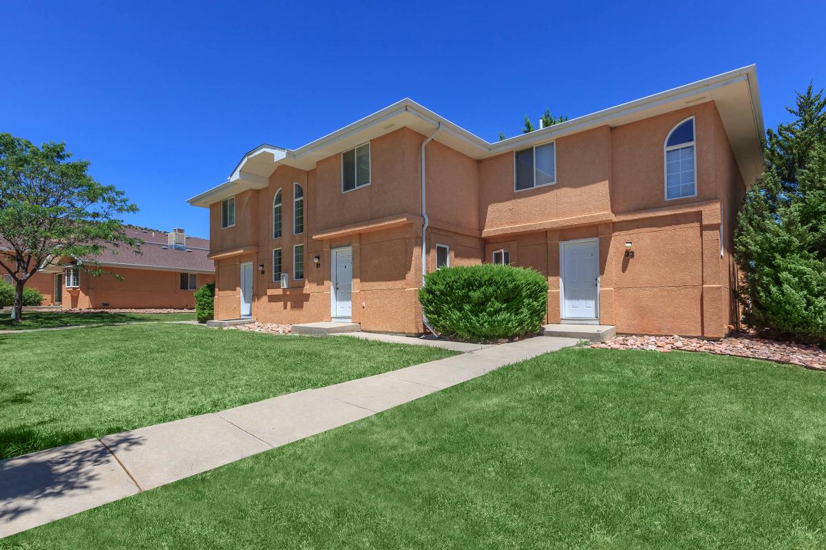 a large lawn in front of a house