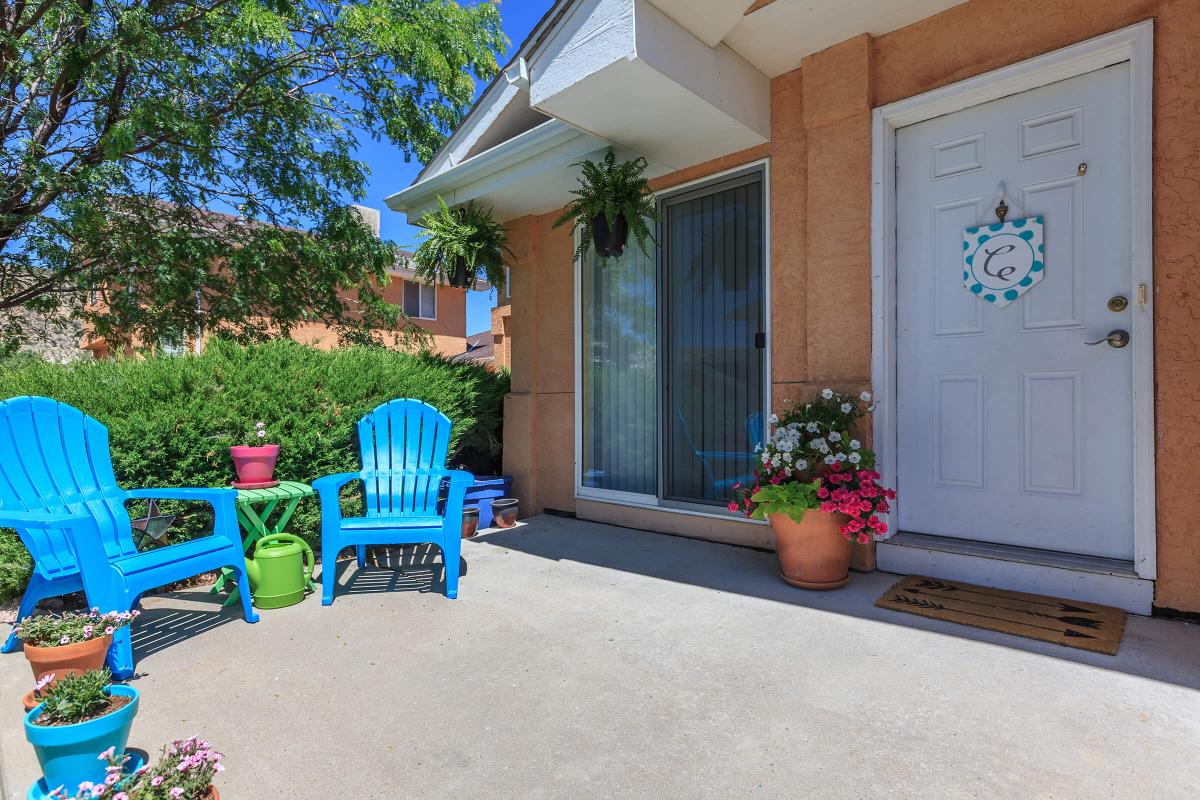 a chair sitting in front of a blue bench