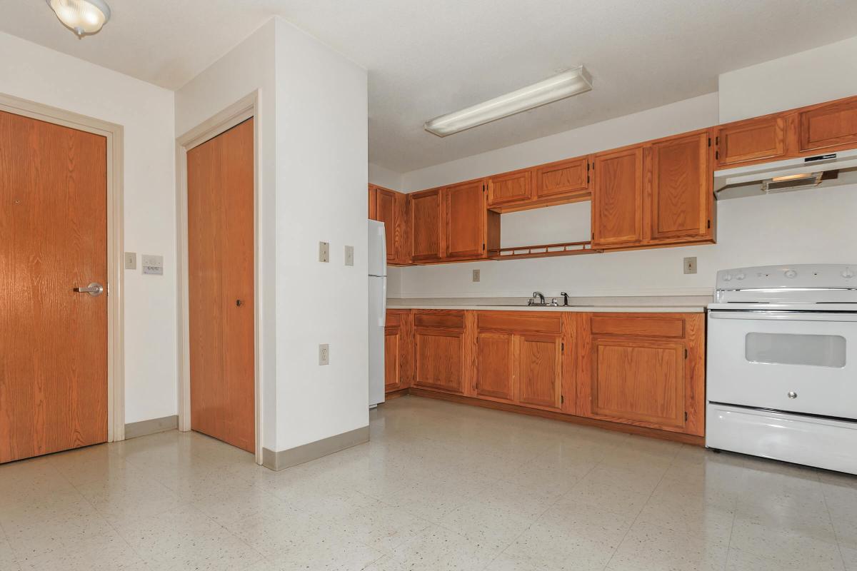 a kitchen with a wood floor