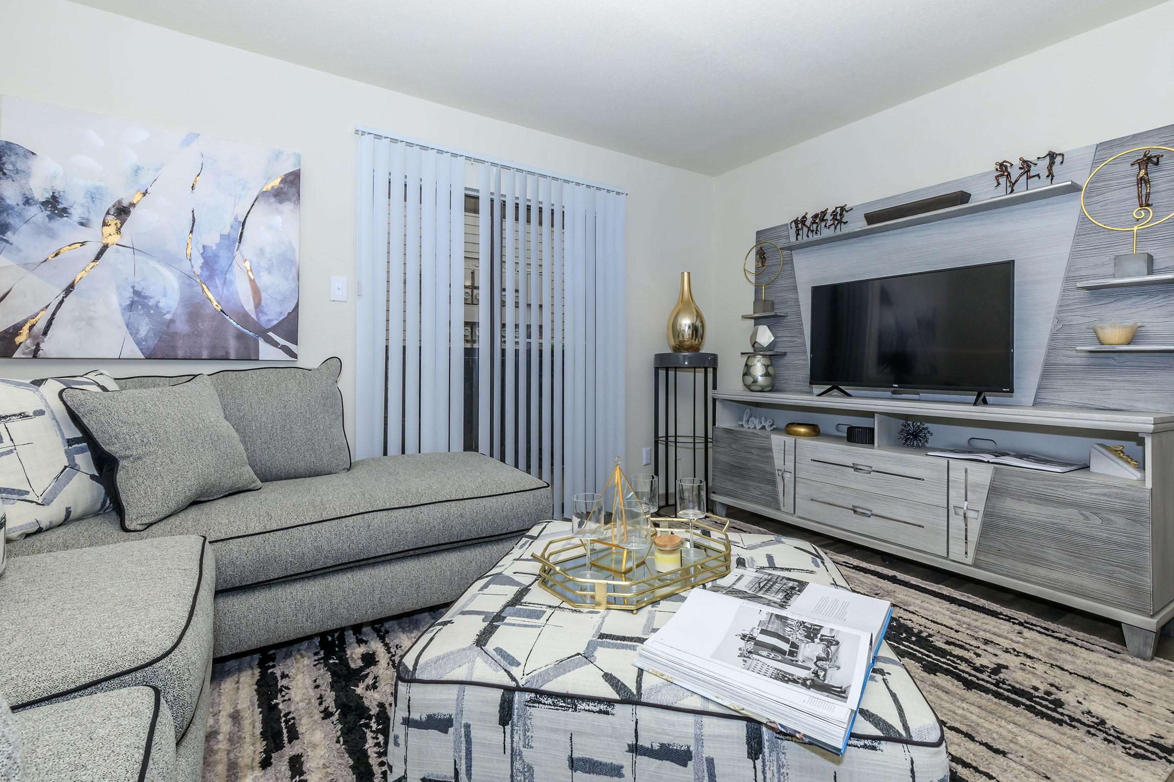 a bedroom with a bed in a room