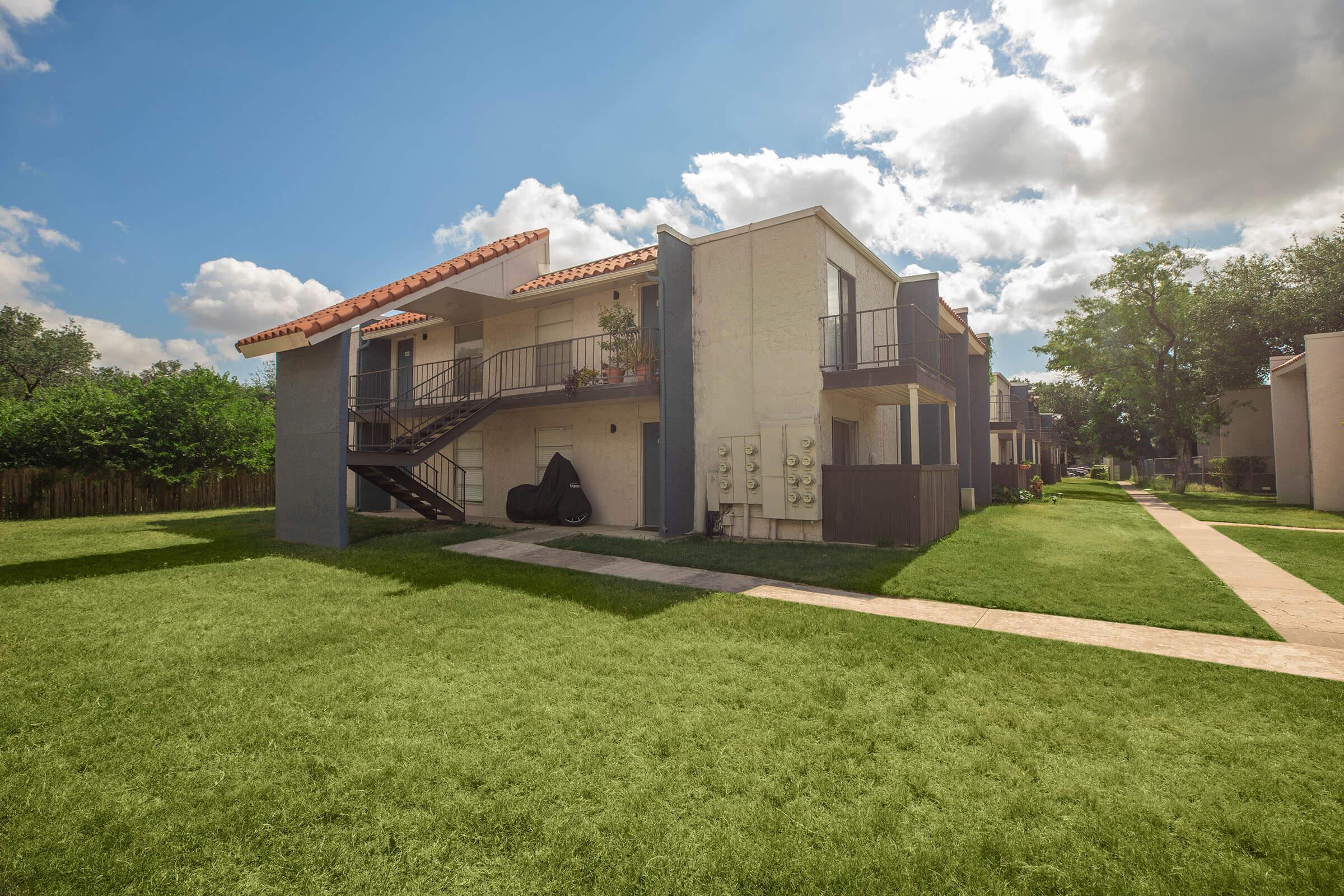 a large lawn in front of a house