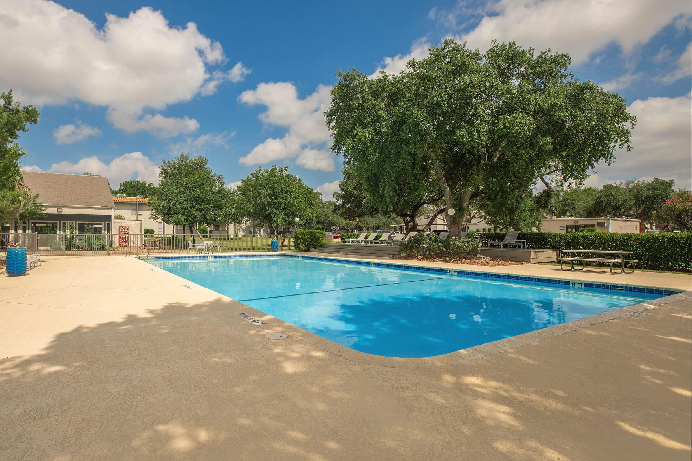 a pool next to a body of water