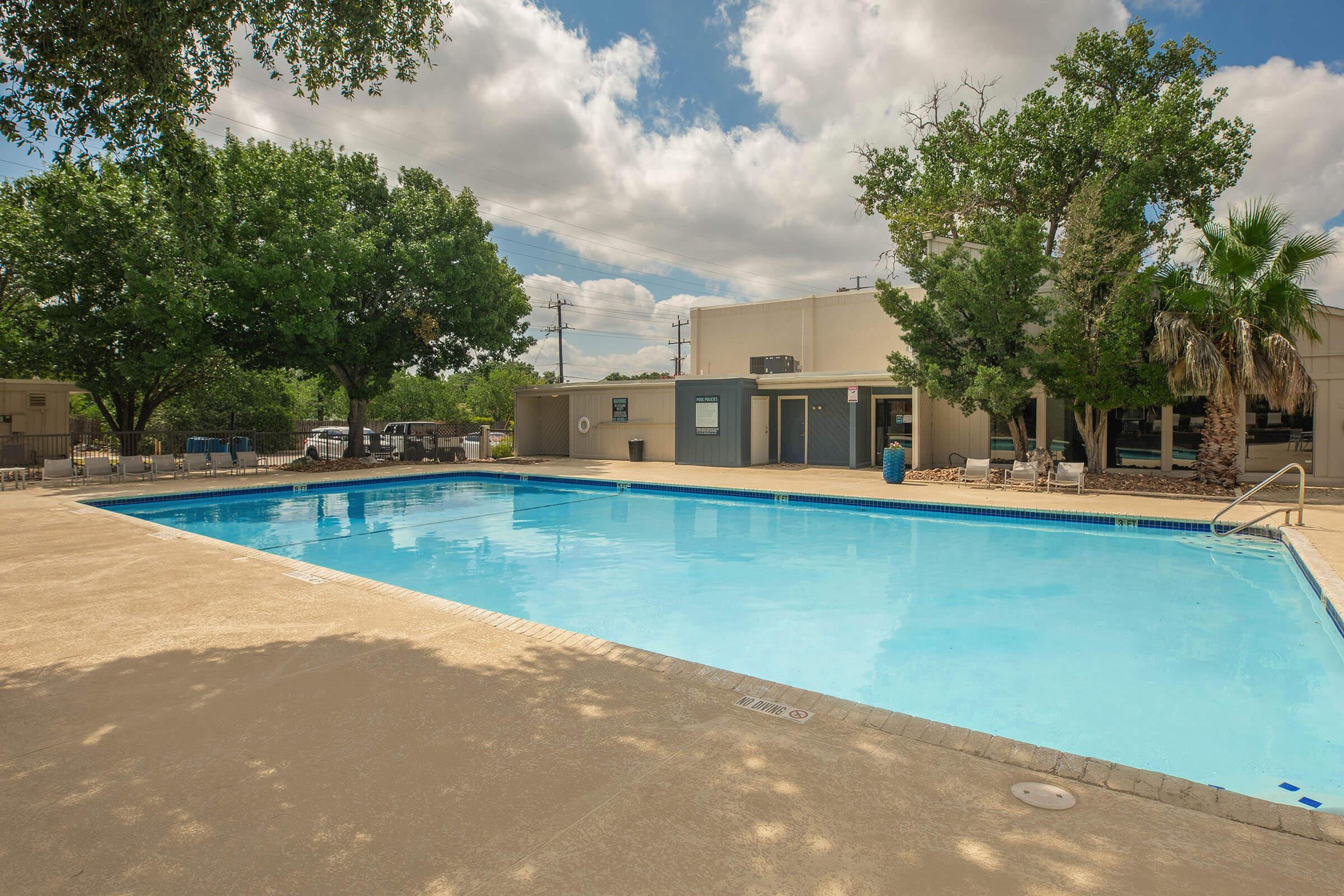 a pool next to a body of water