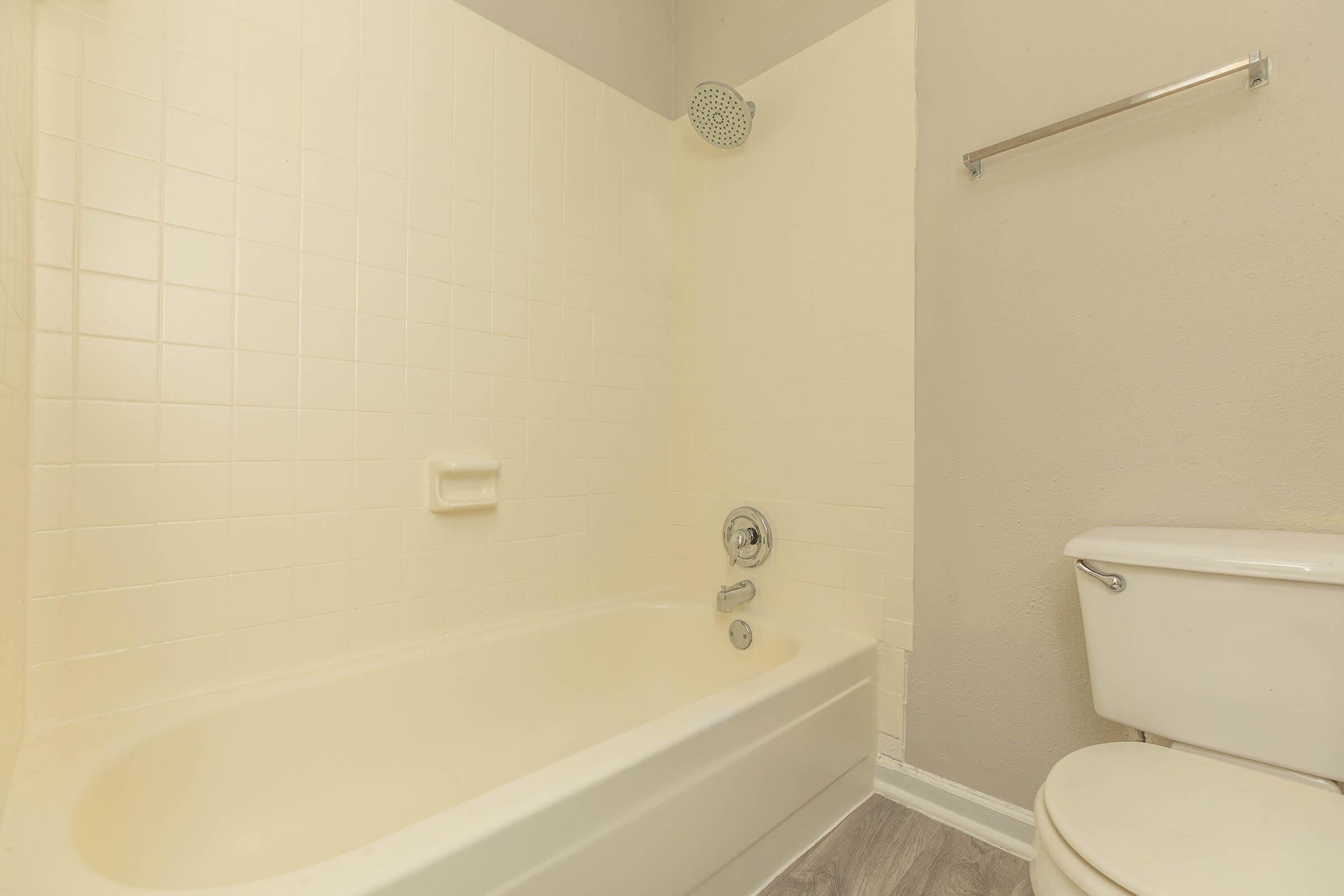 a close up of a sink and a bath tub