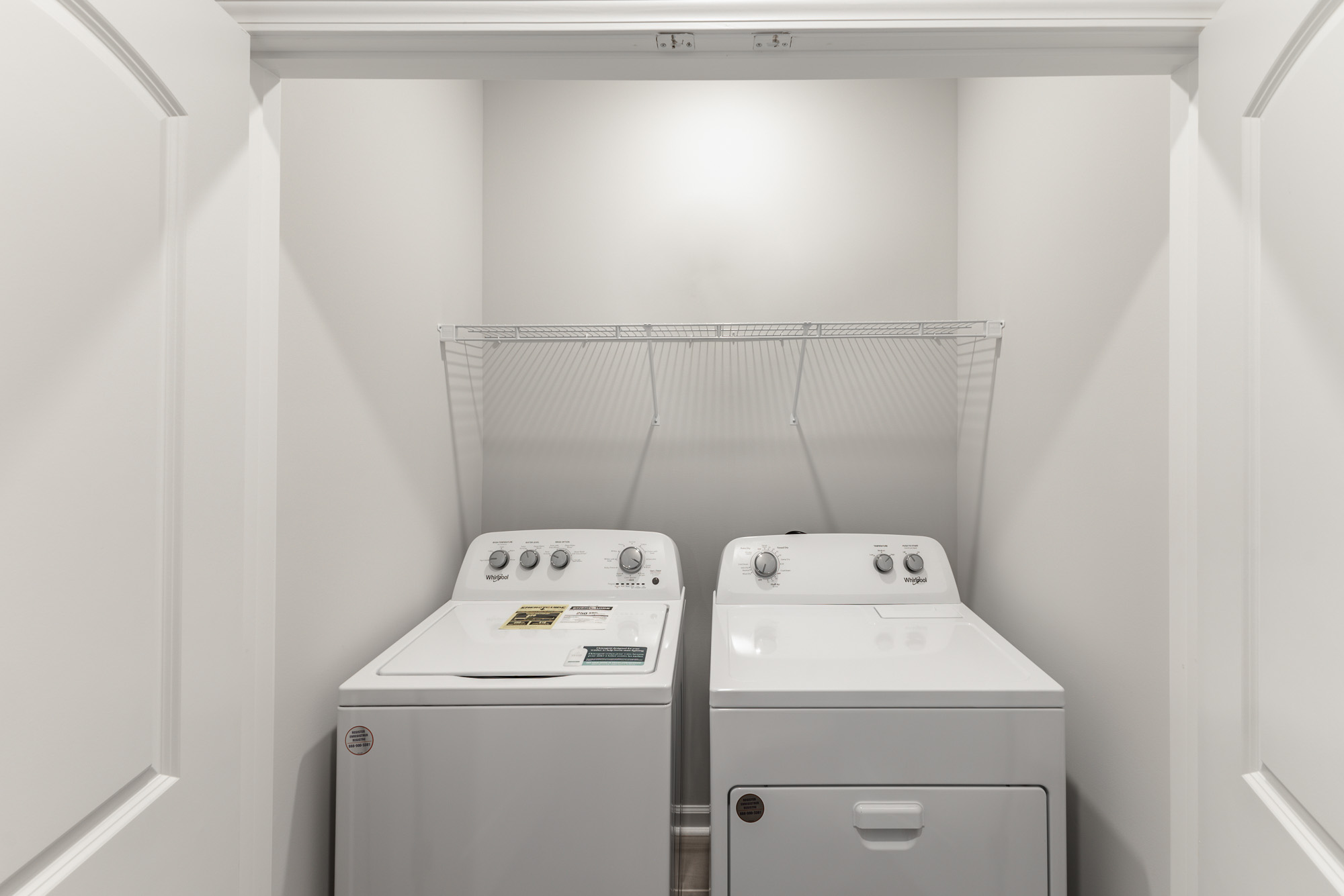 a refrigerator freezer sitting next to a sink