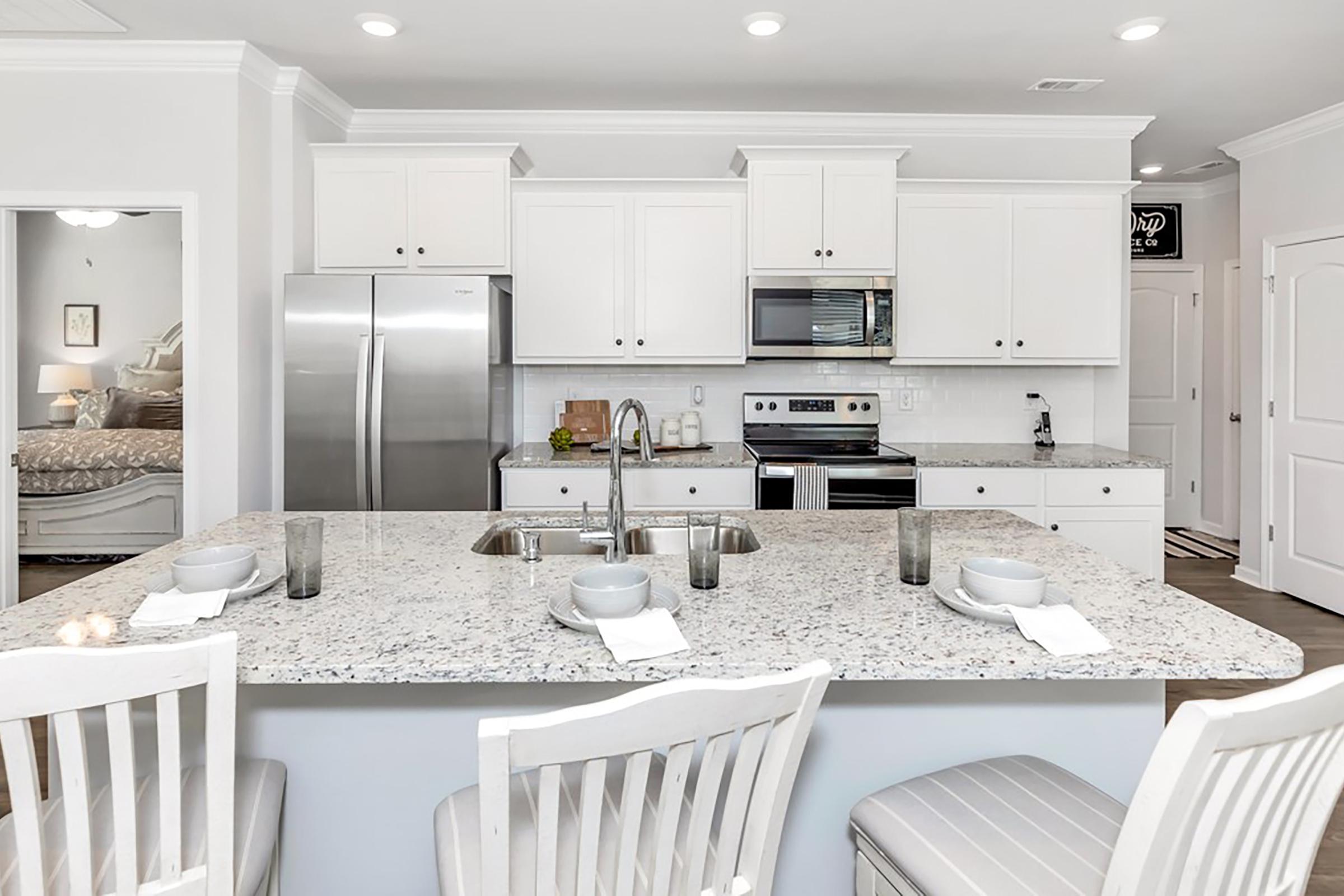 a kitchen with a dining table