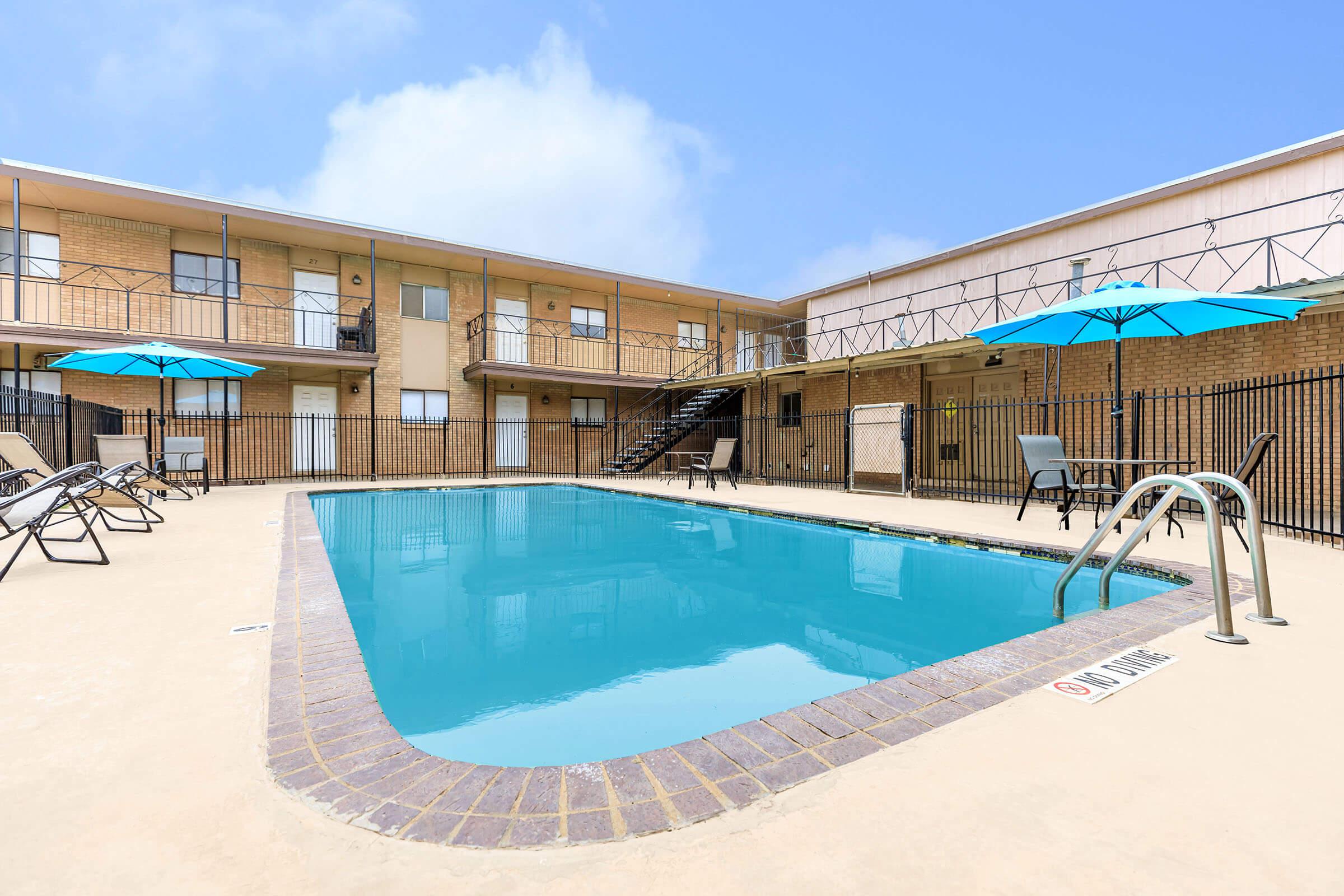 a pool next to a building