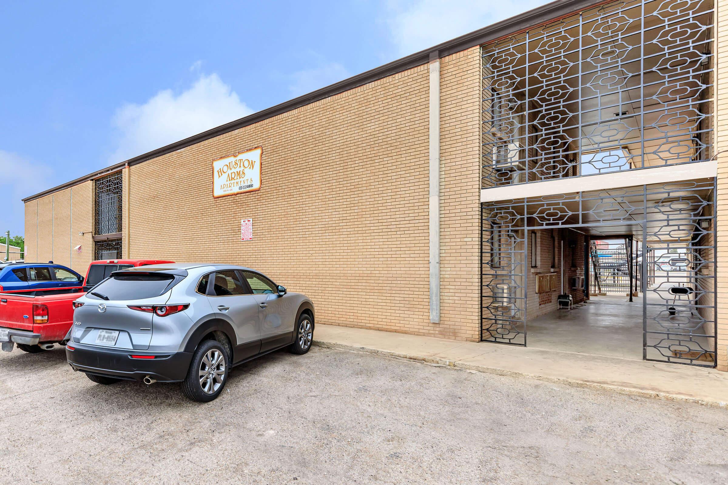 a car parked in front of a building