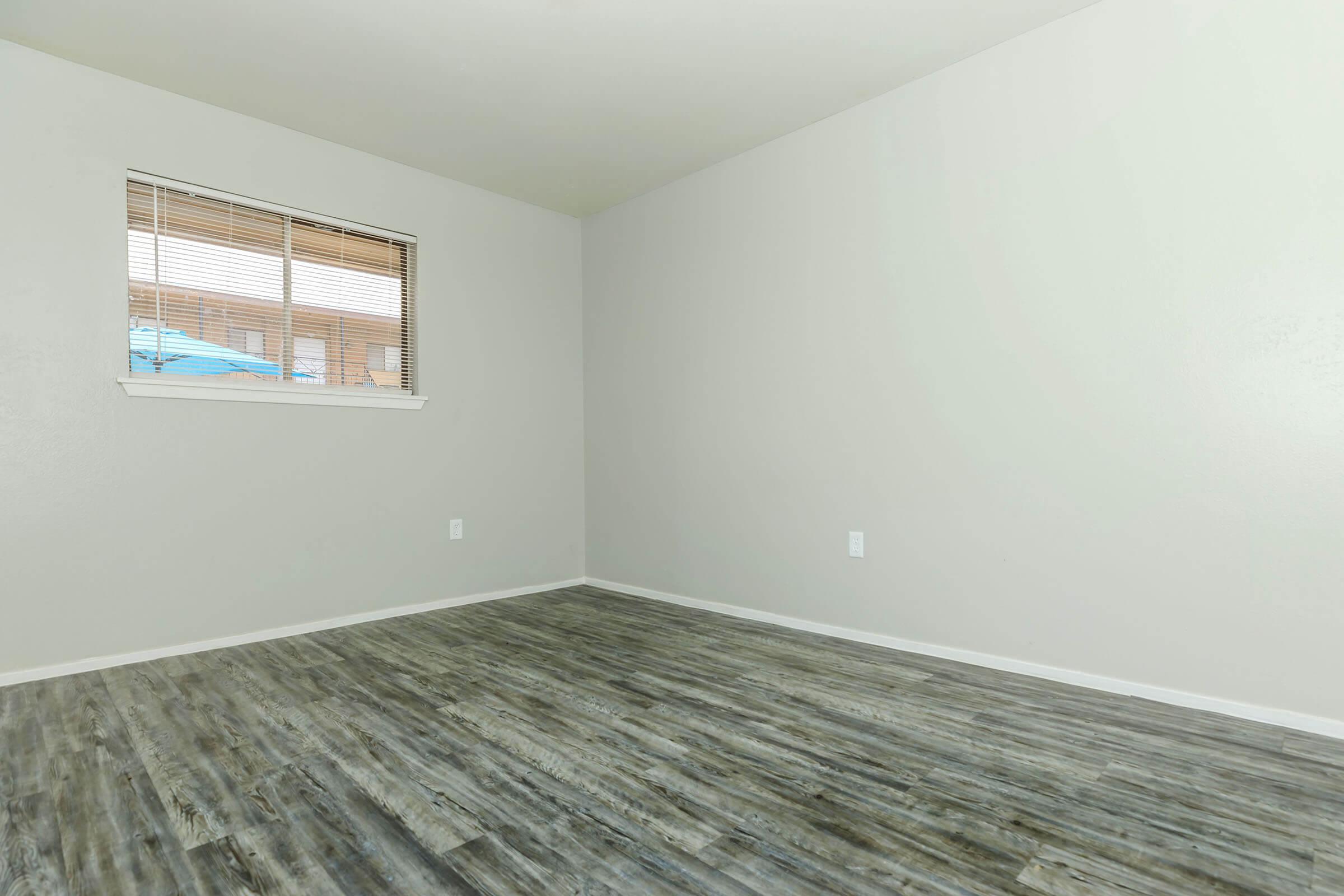 STUNNING FLOORS IN COMFORTABLE BEDROOM