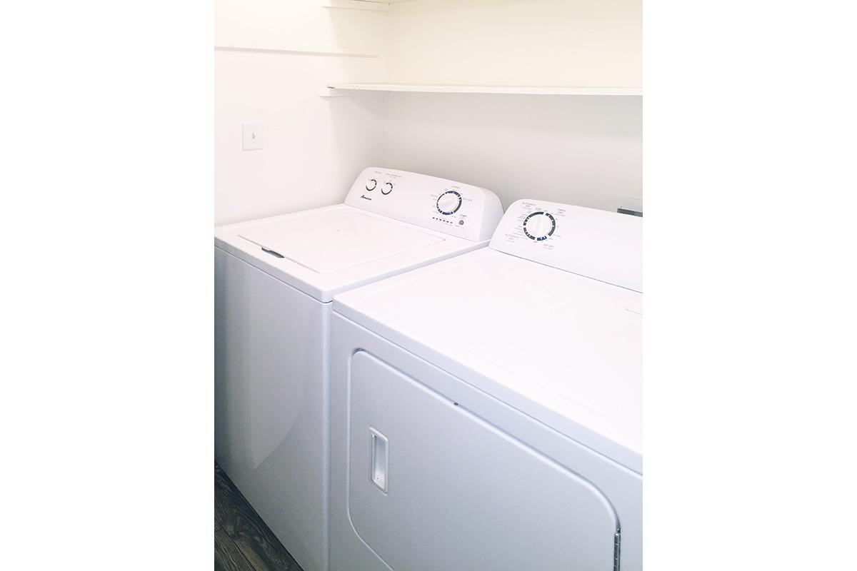 WASHER AND DRYER IN HOME AT UNIVERSITY VILLAGE AT WALKER ROAD IN JACKSON, TENNESSEE