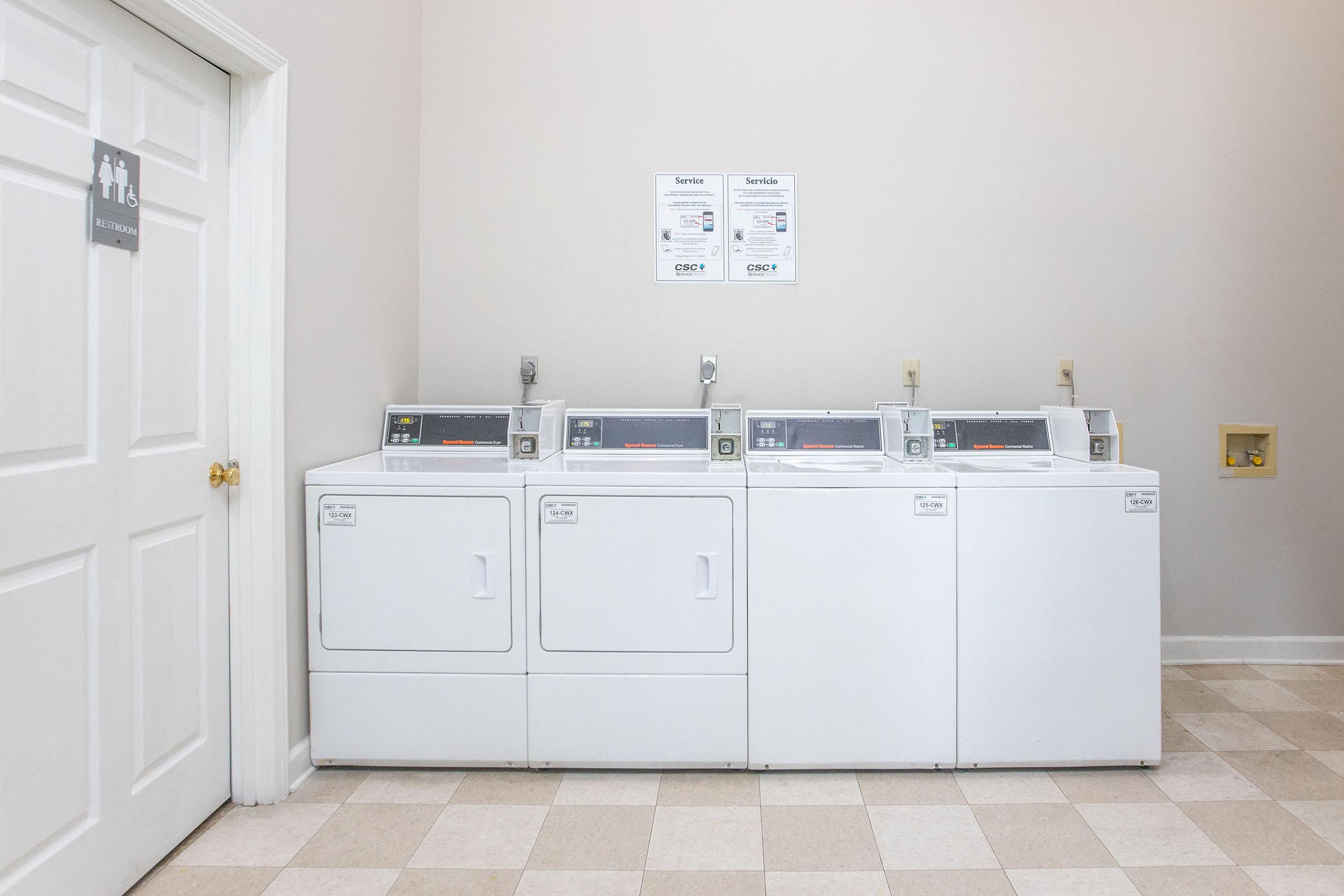 a kitchen with a stove and a refrigerator