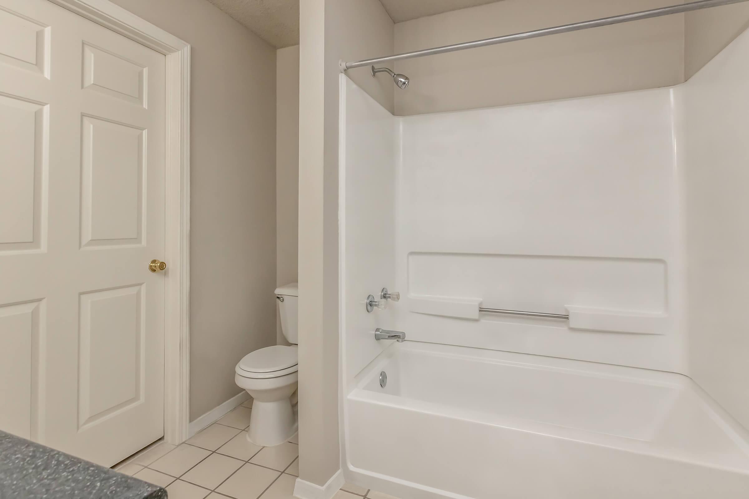 a room with a sink and a shower