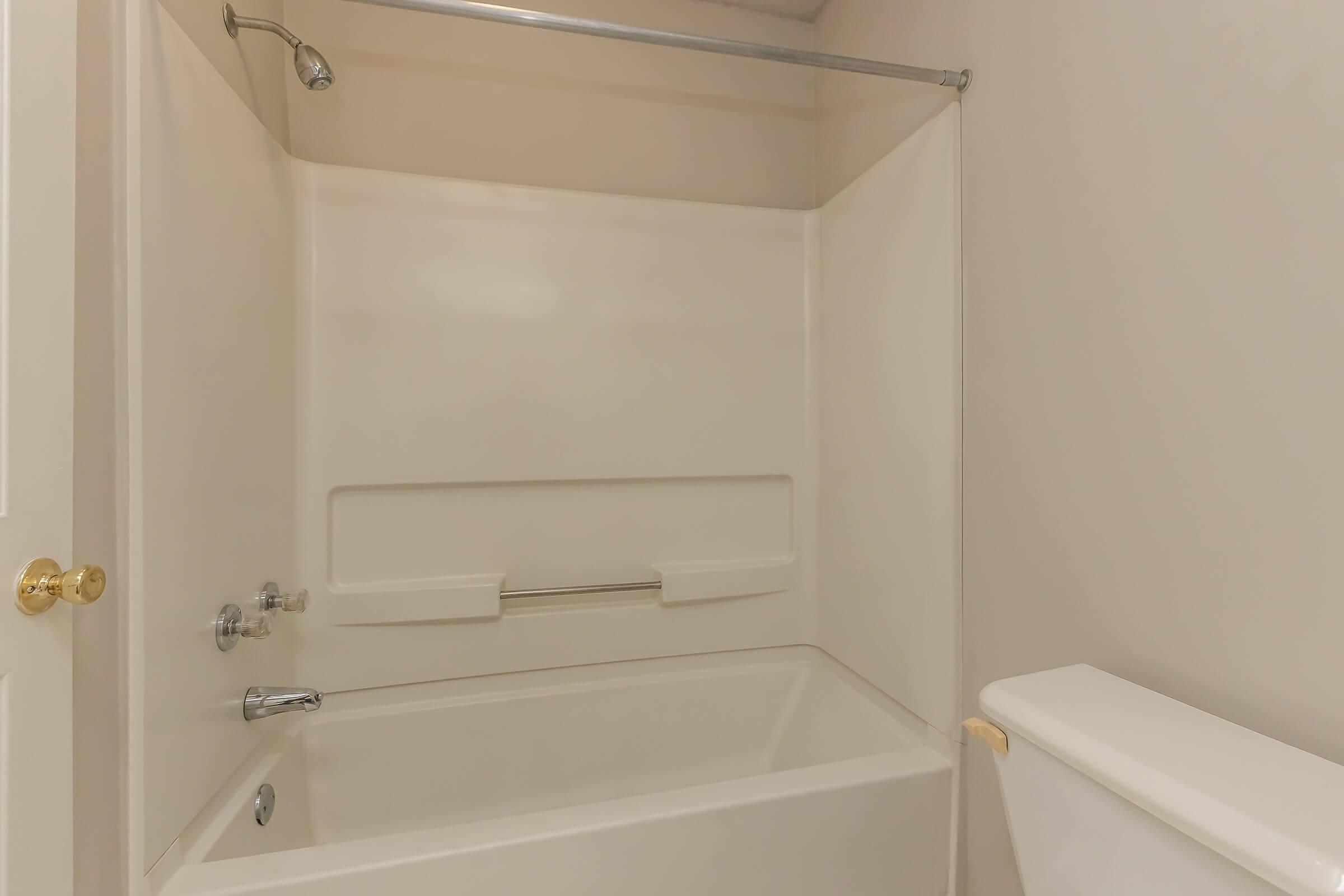 a room with a sink and a bath tub