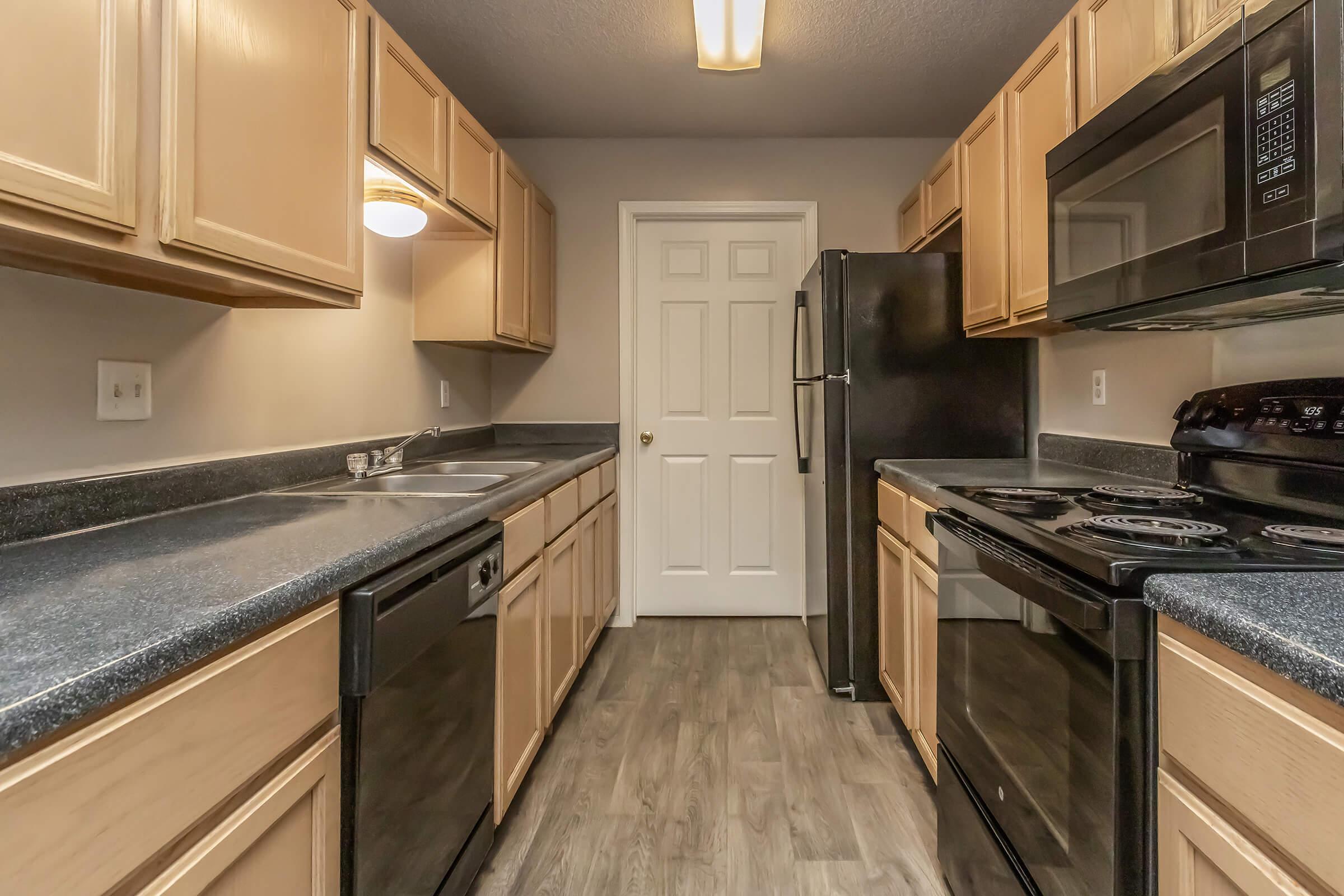 a modern kitchen with stainless steel appliances