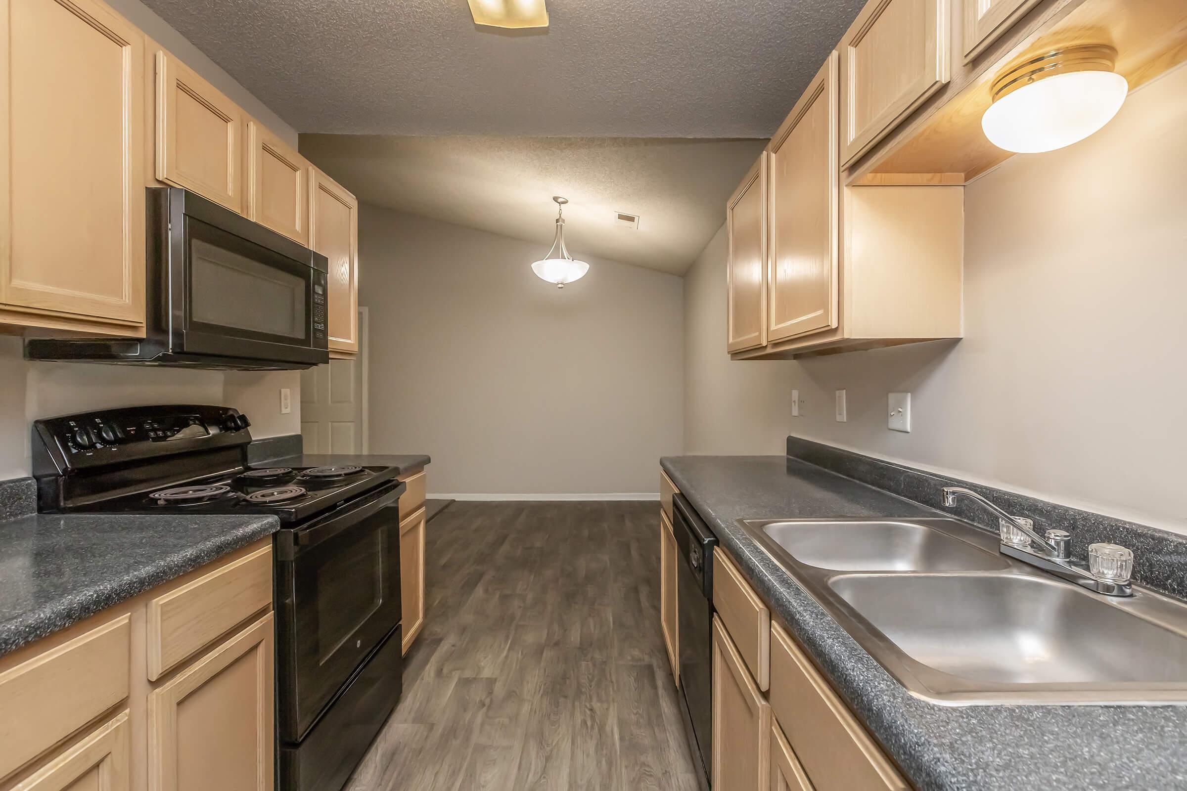 a modern kitchen with stainless steel appliances