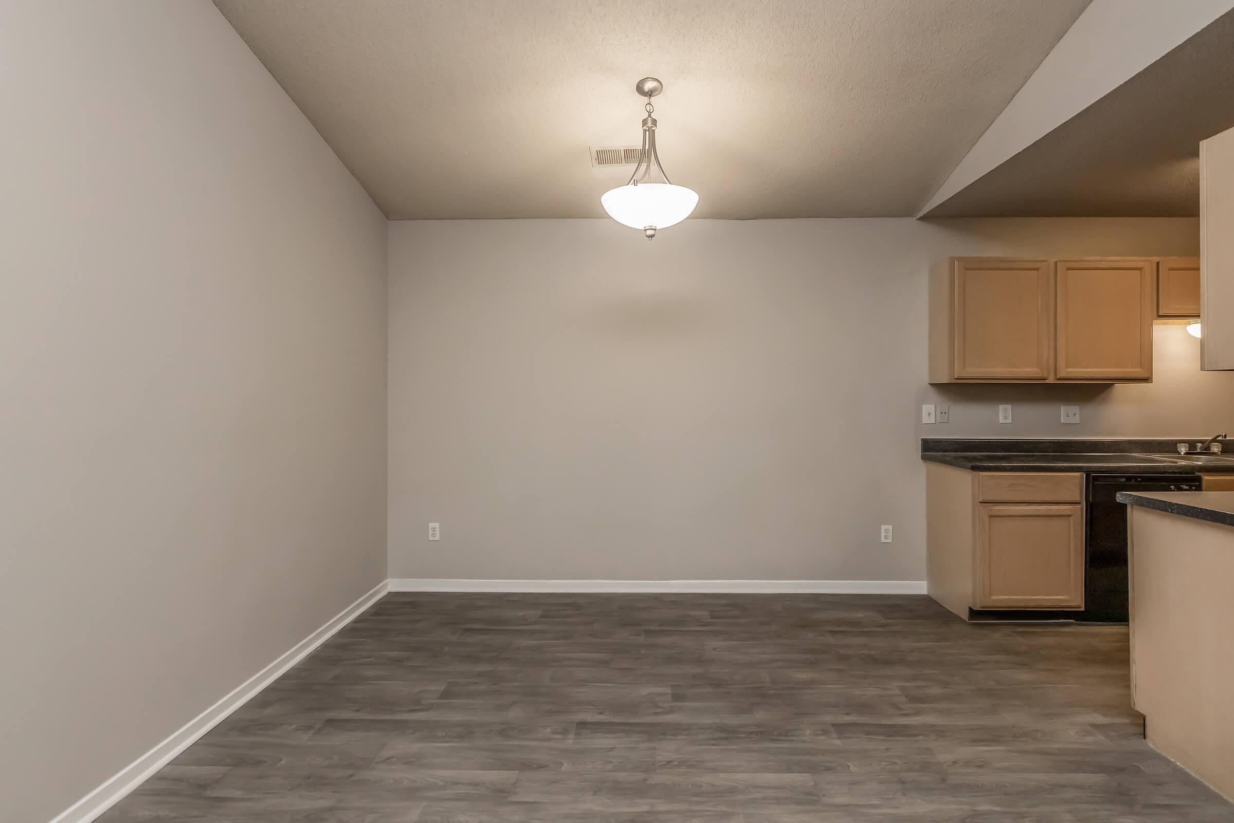 a kitchen with a wooden floor