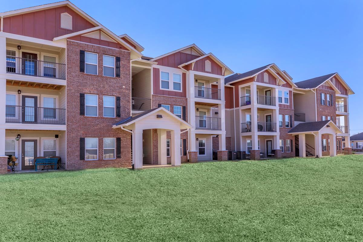 a large lawn in front of a house