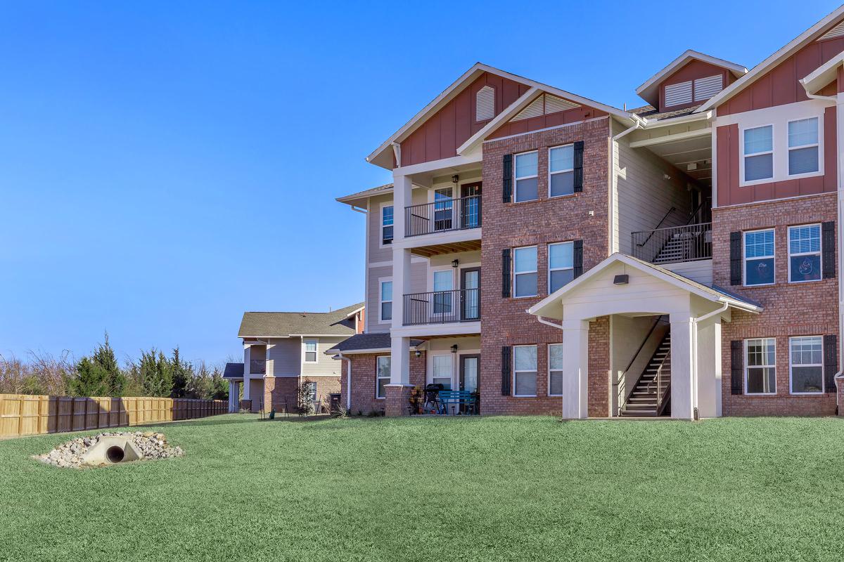 a large lawn in front of a house
