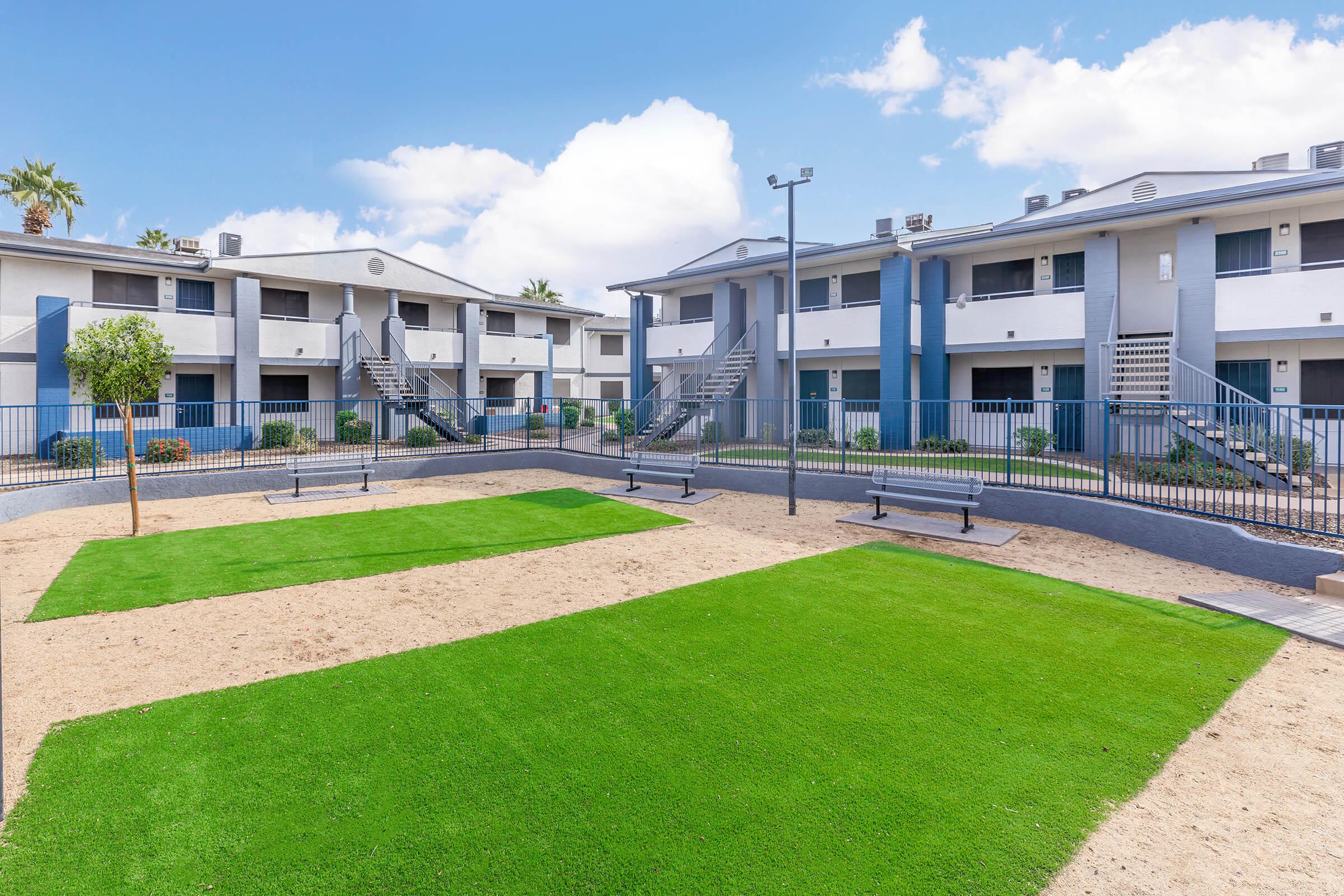 a large lawn in front of a building