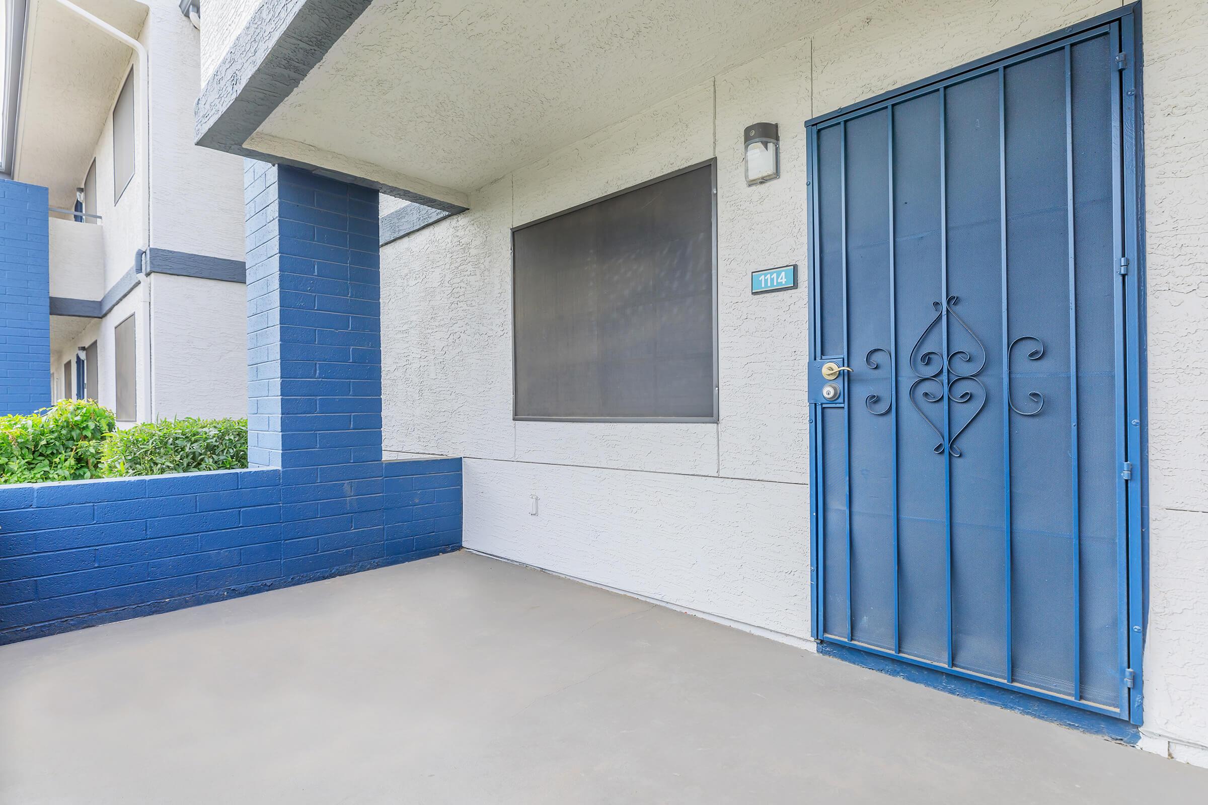 a close up of a blue door