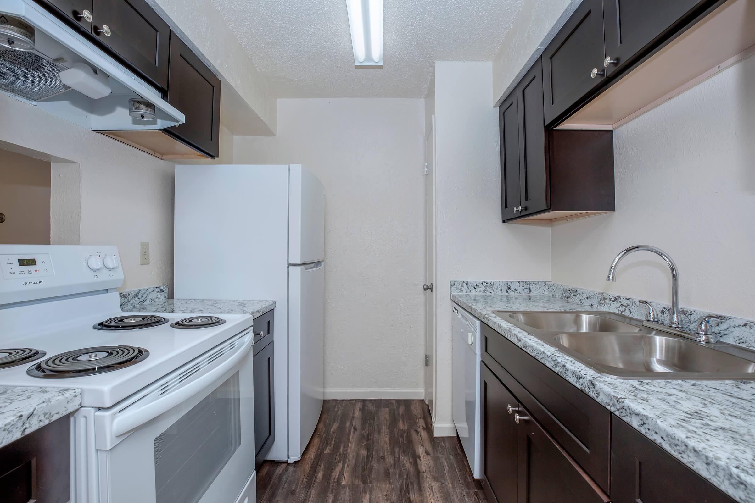 ALL-ELECTRIC KITCHEN AT COUNTRY GREEN APARTMENTS