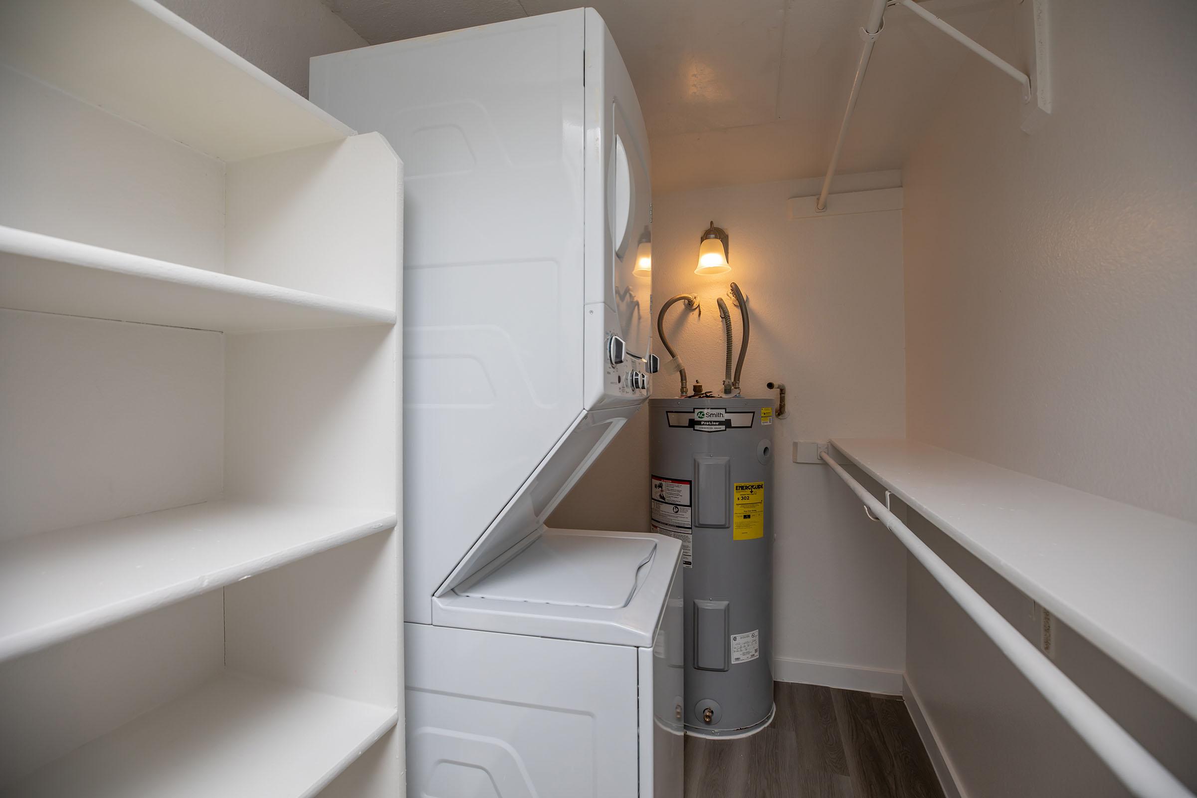 a kitchen with a sink and a mirror
