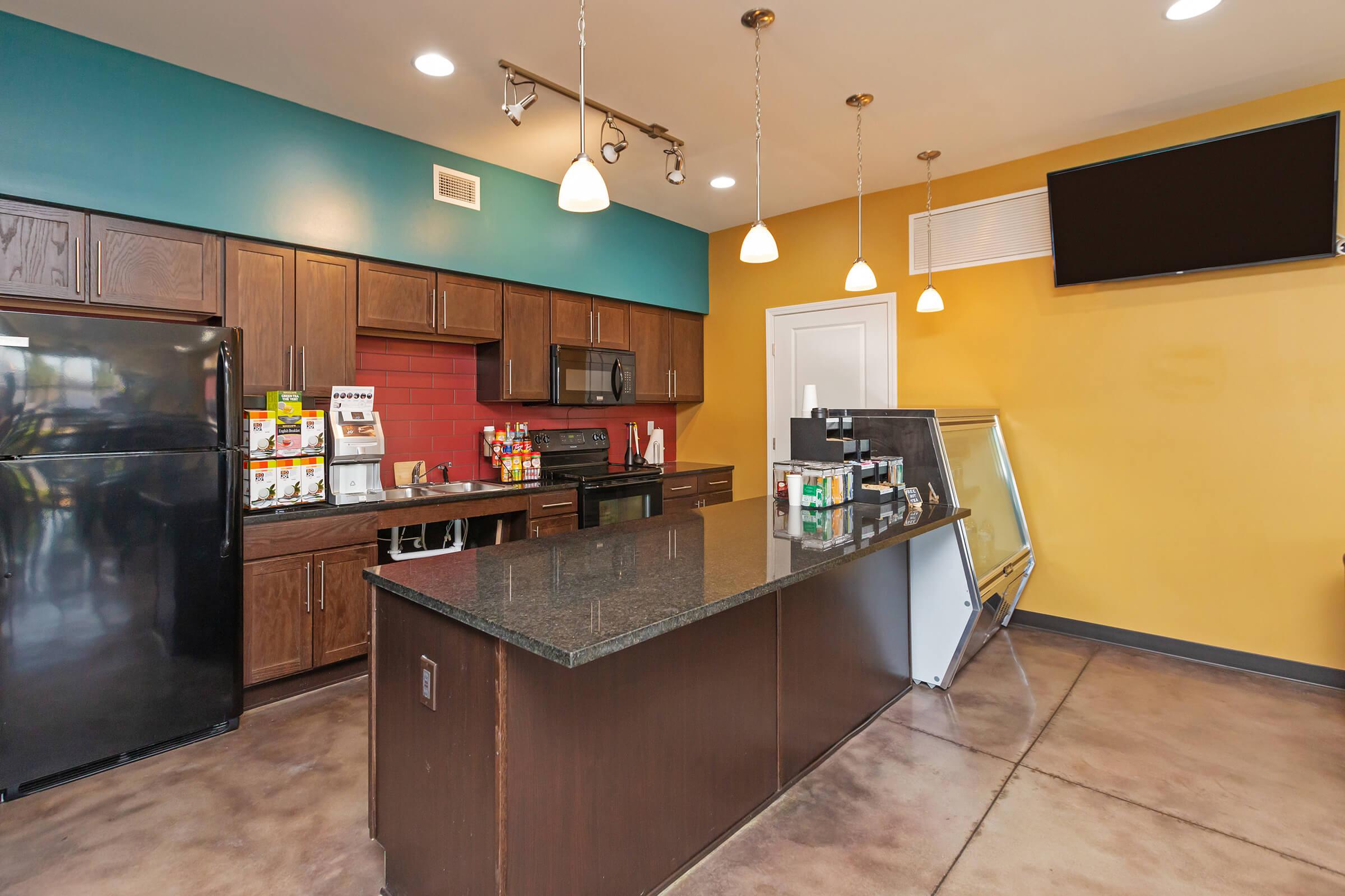 a modern kitchen with stainless steel appliances