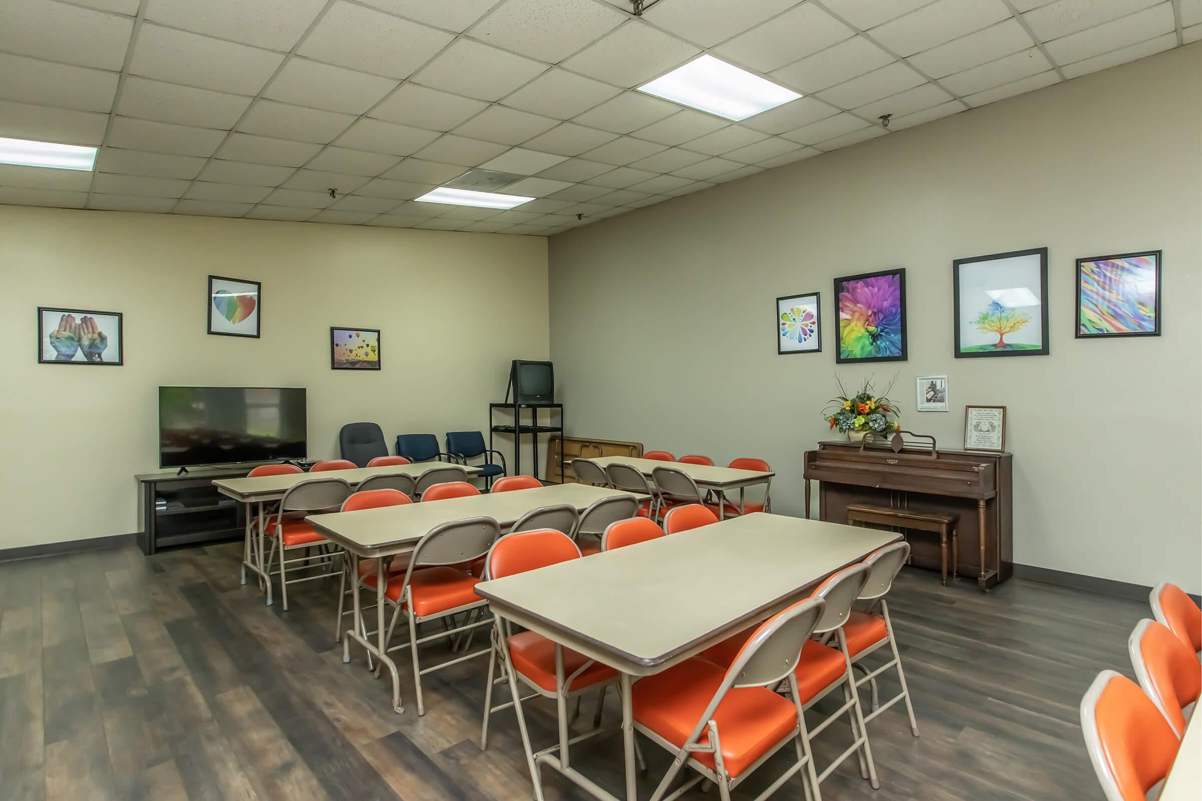 a room filled with furniture and a table