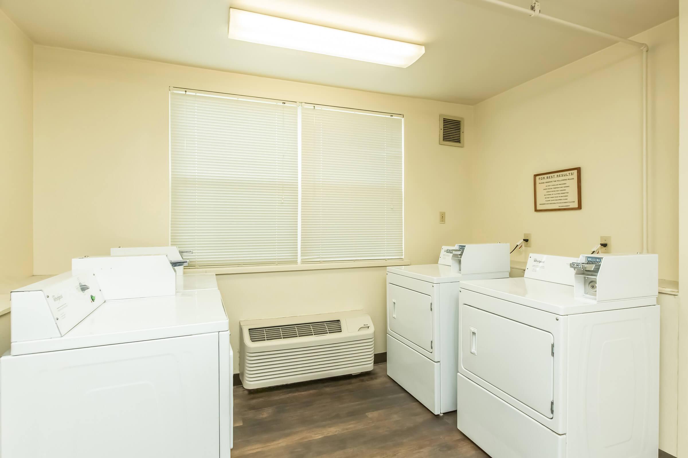 a kitchen with a sink and a window