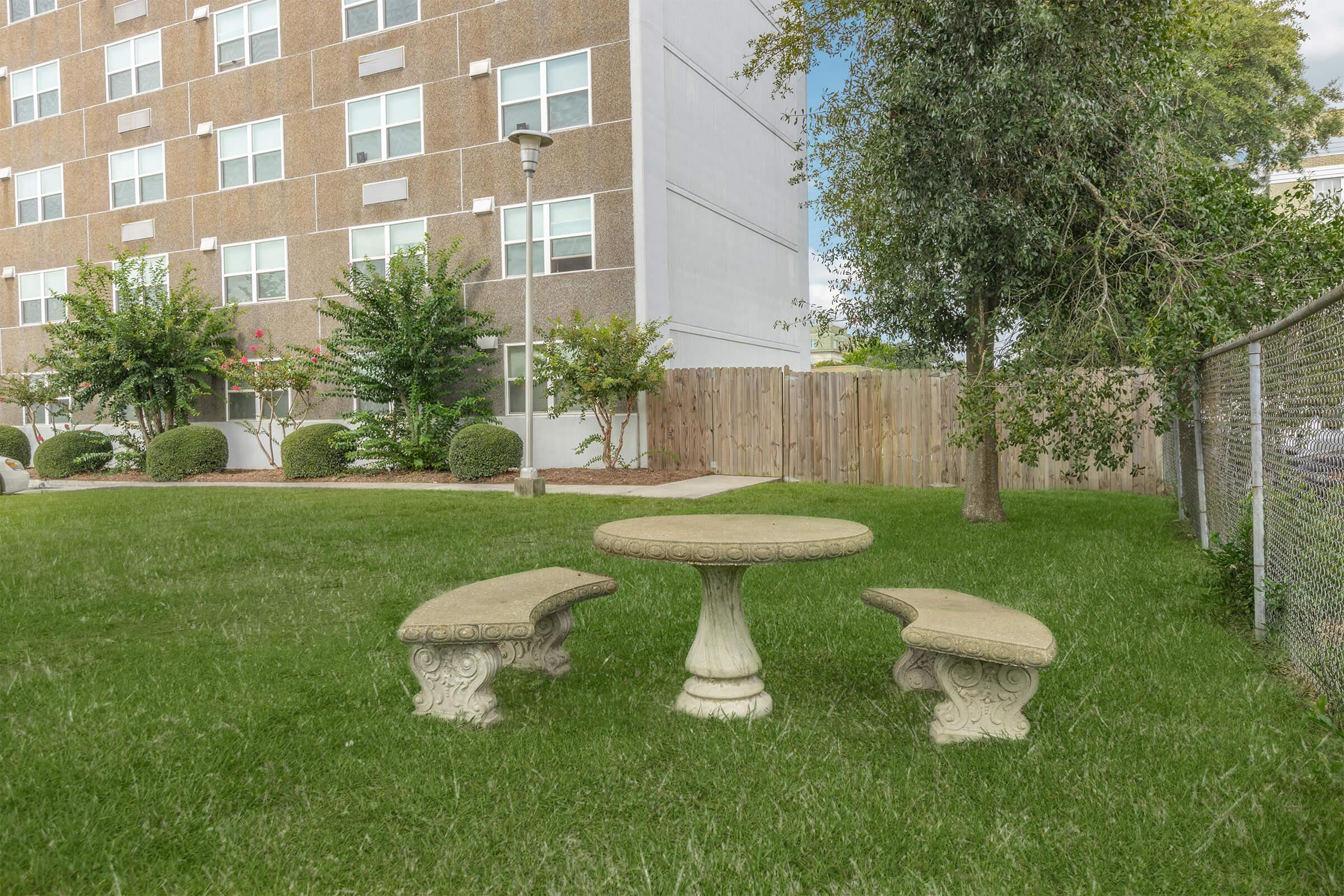 a large lawn in front of a building