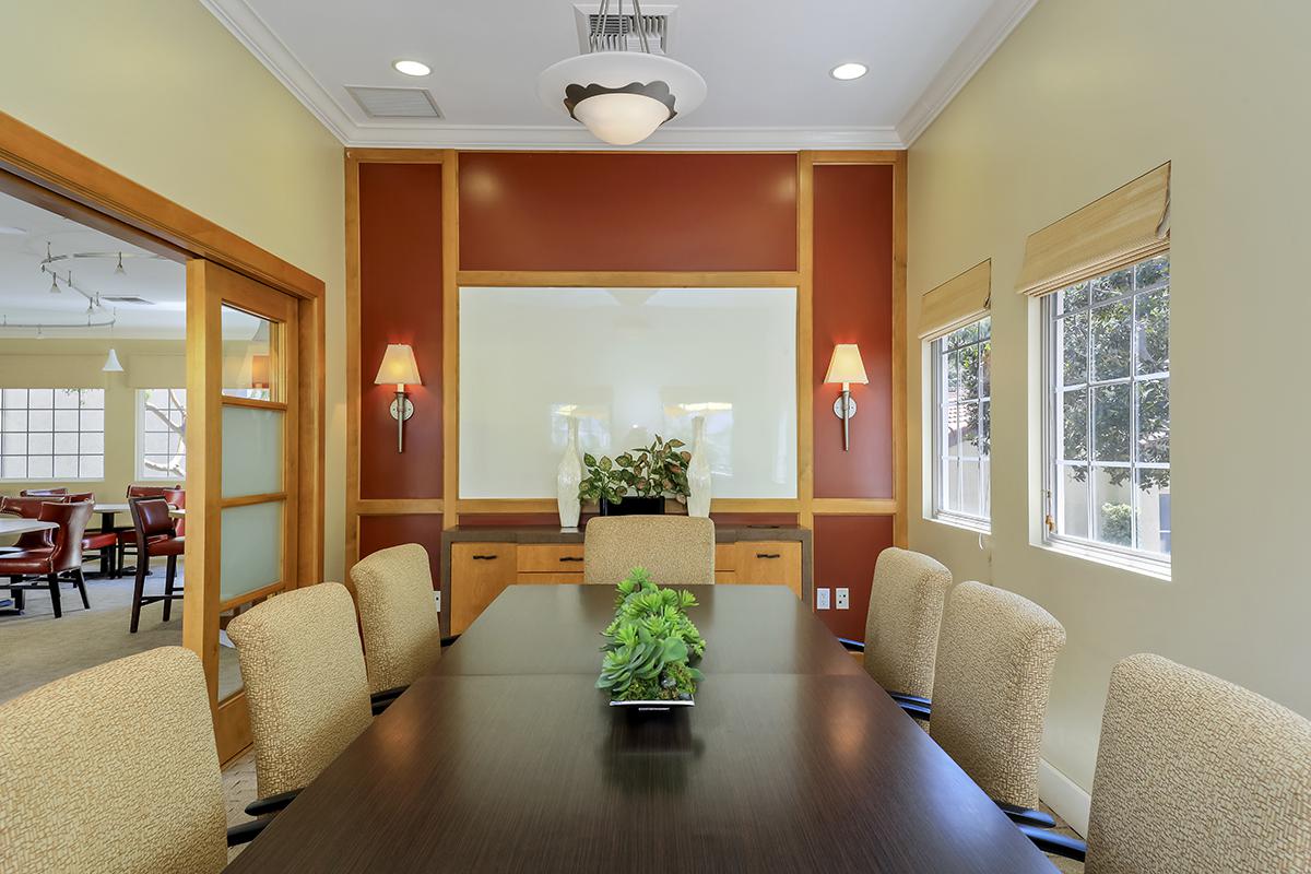 Community room with a conference table and chairs