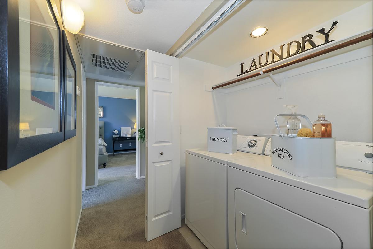 Furnished washer and dryer in laundry room