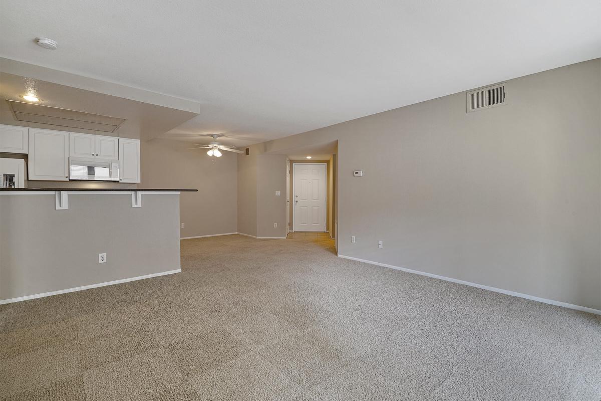 Unfurnished living room with carpet