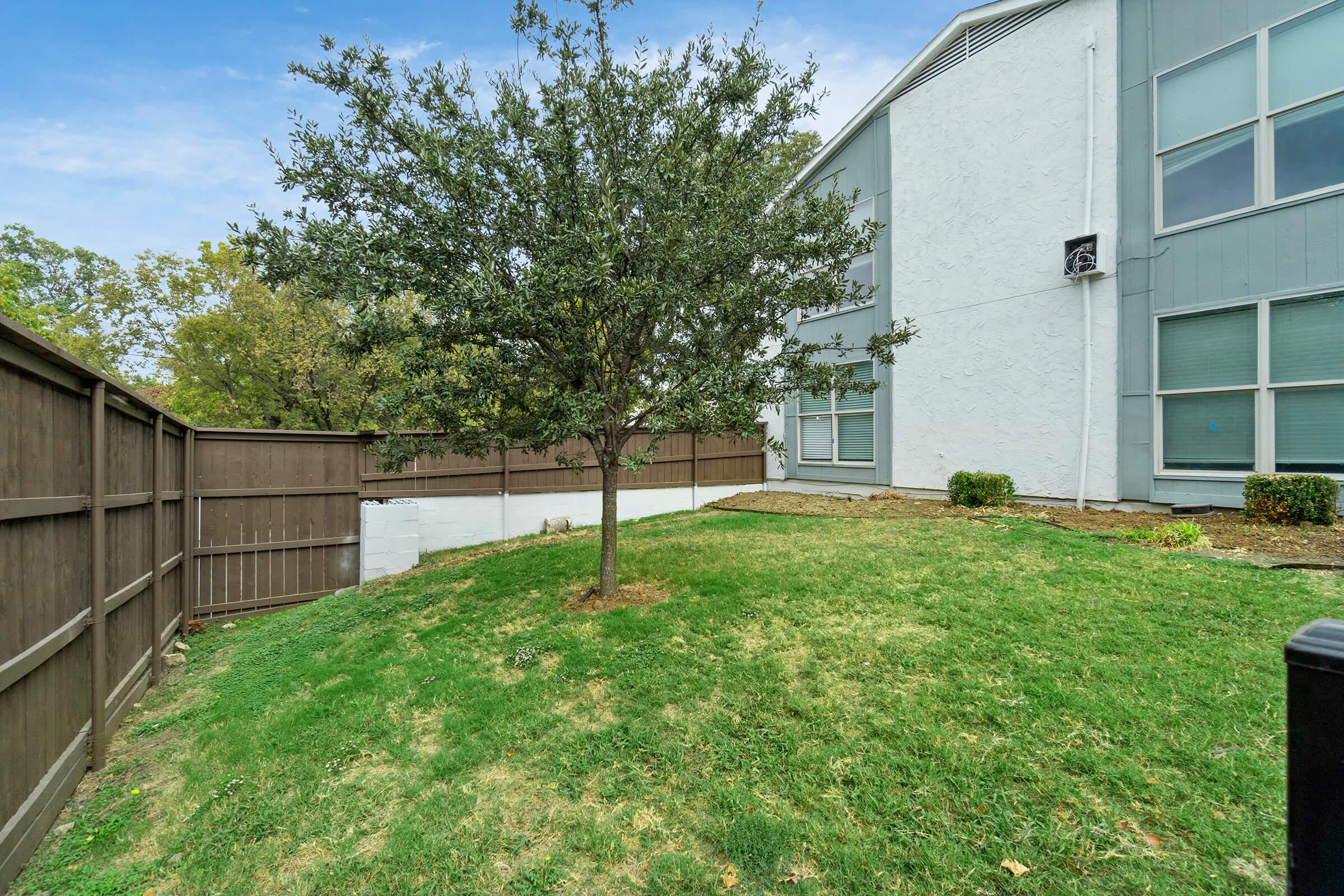 a large lawn in front of a house