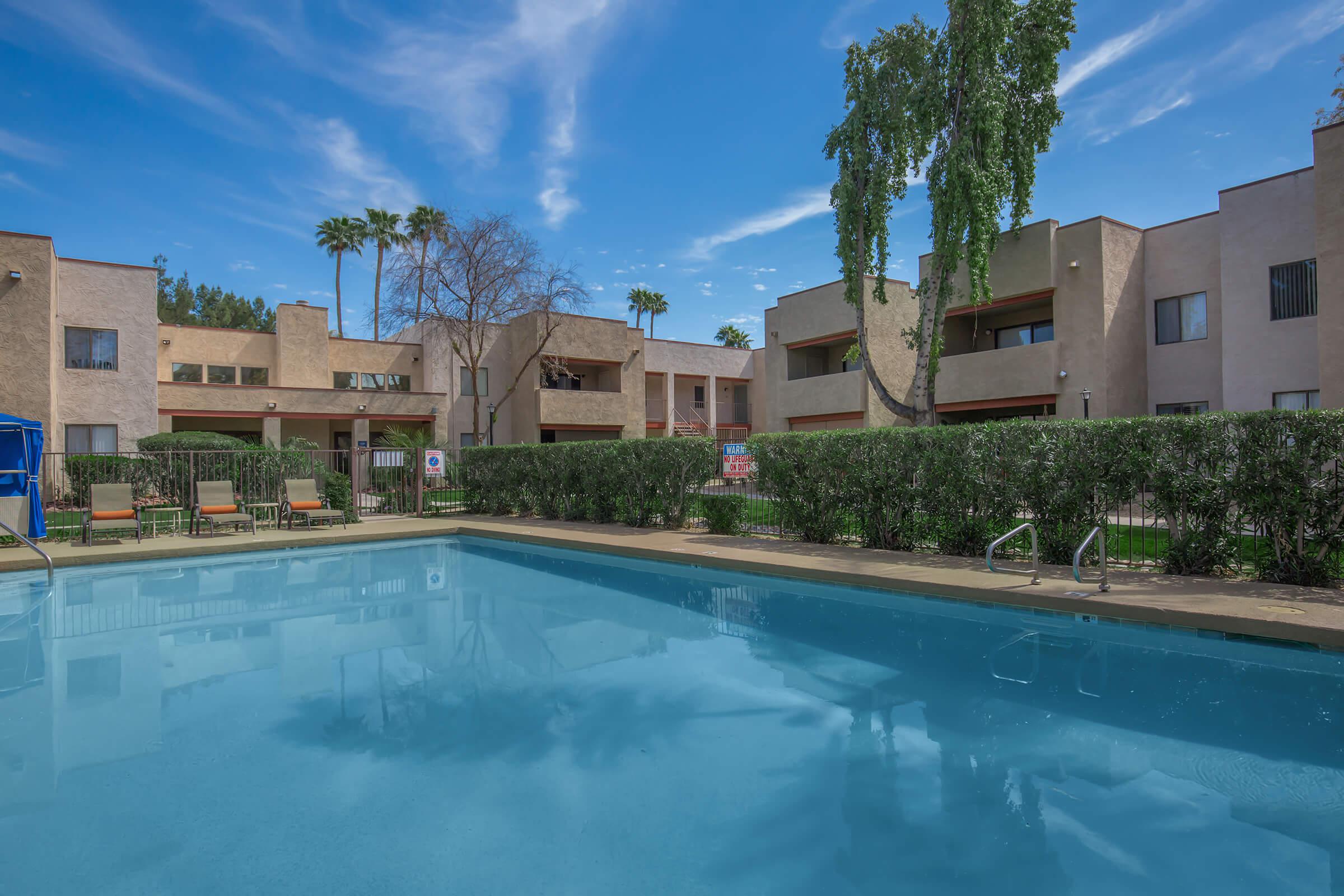 a house with a large pool of water