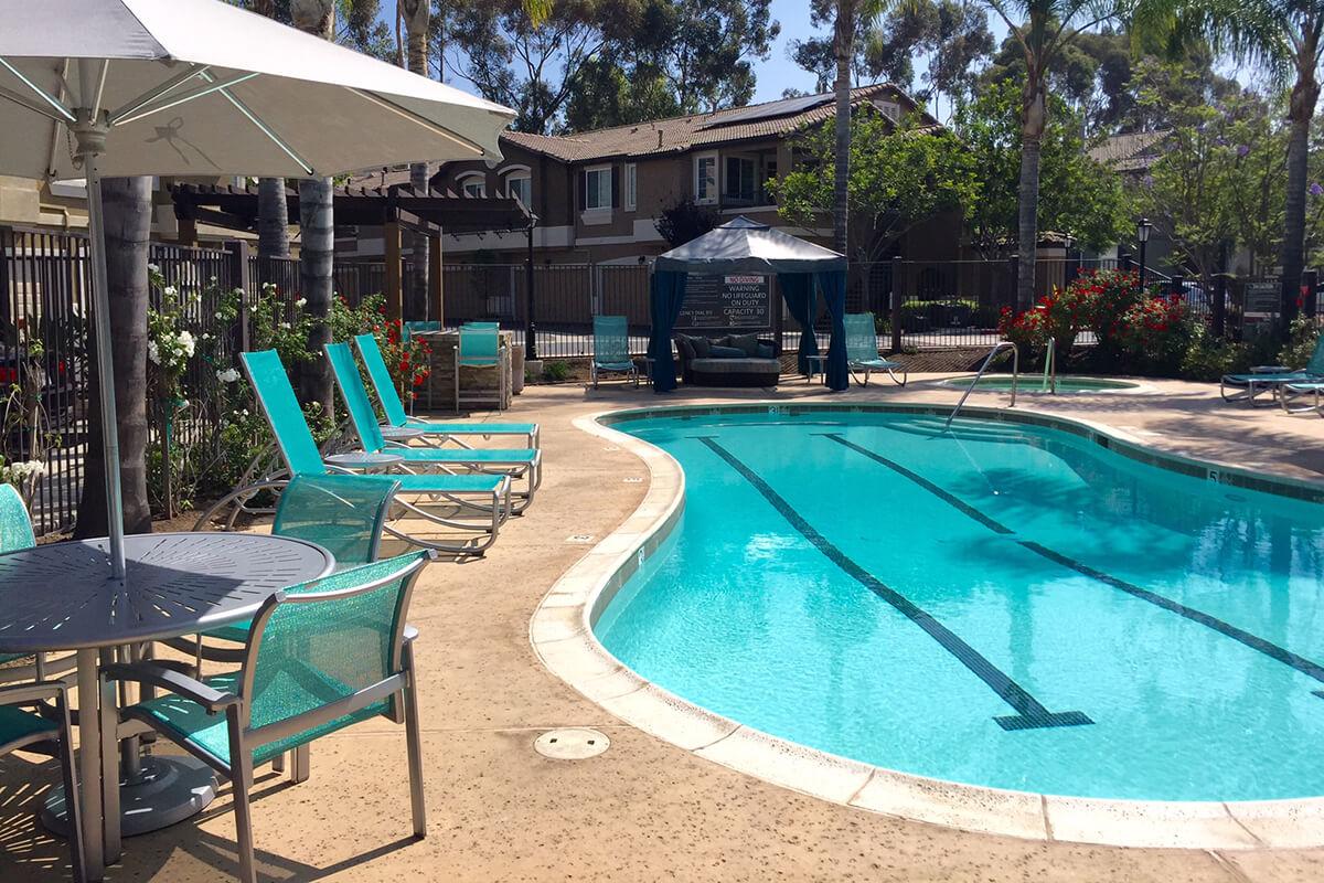 a chair sitting in front of a pool