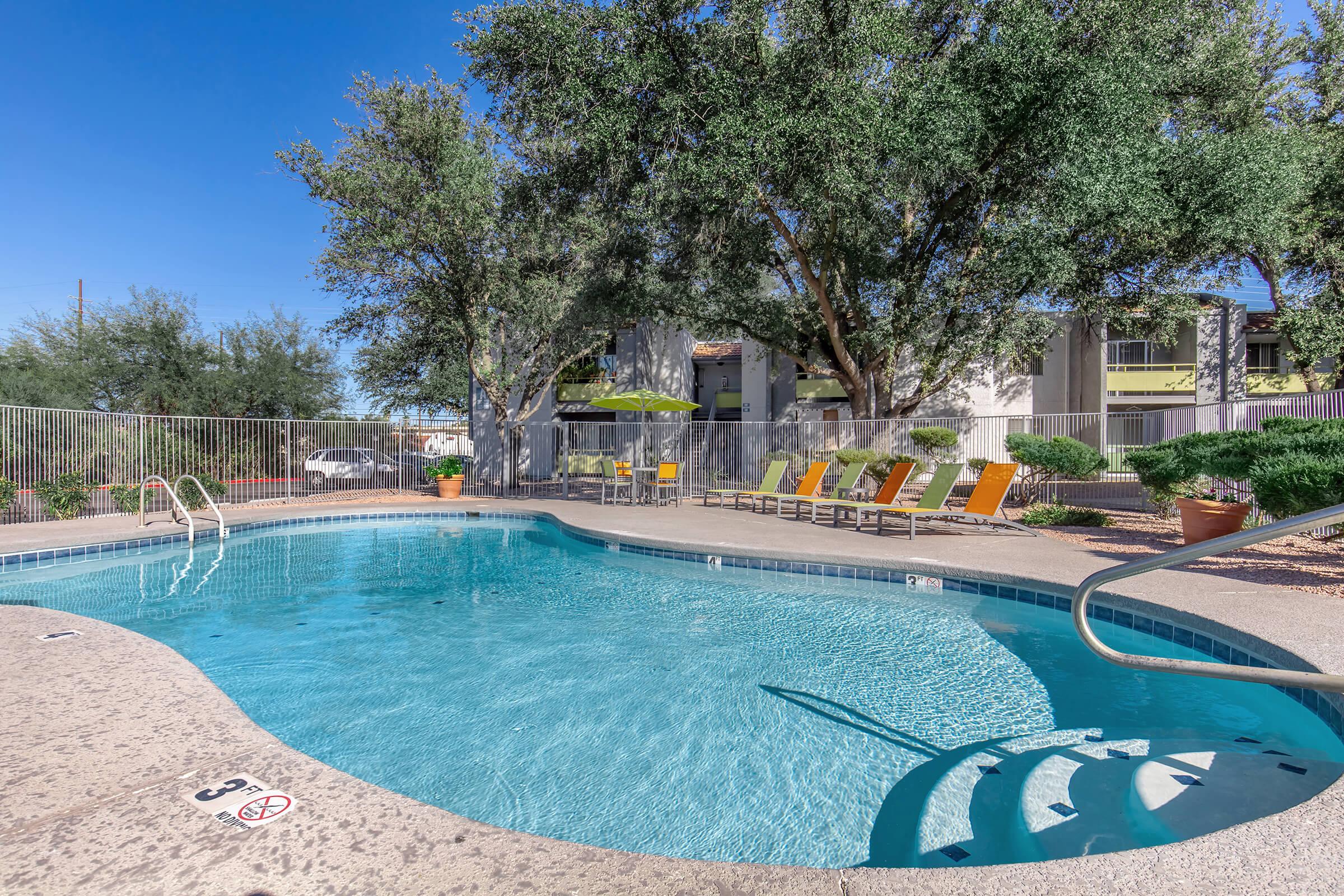 a pool next to a body of water