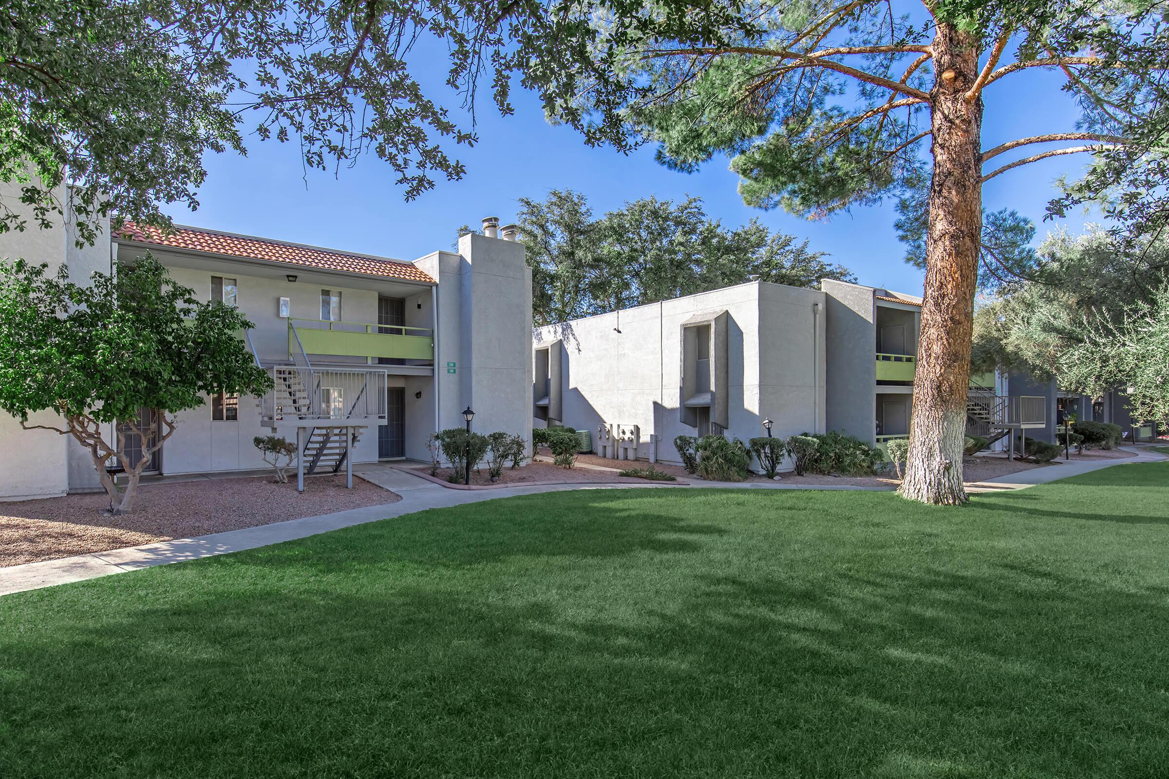 a large lawn in front of a house