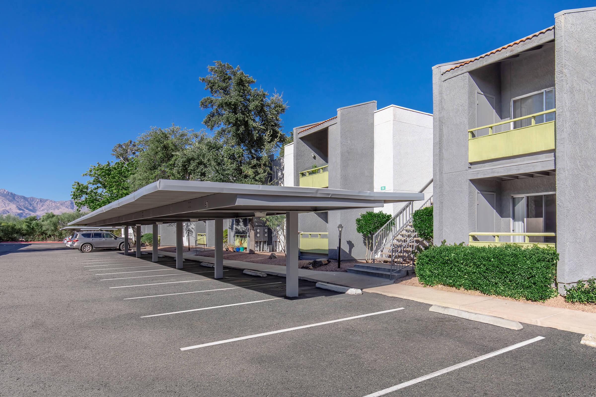 an empty parking lot in front of a building