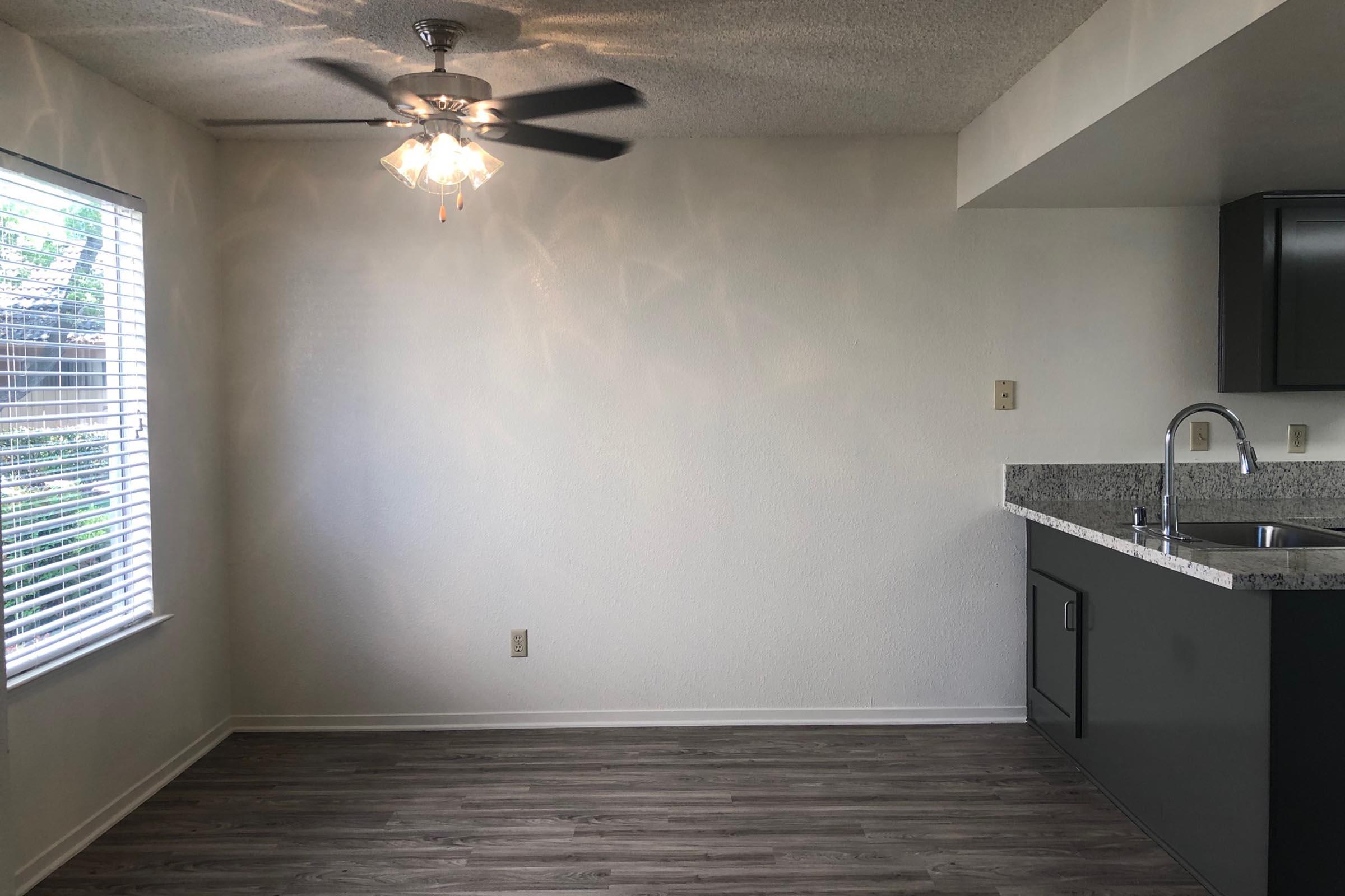 a kitchen with a tile floor