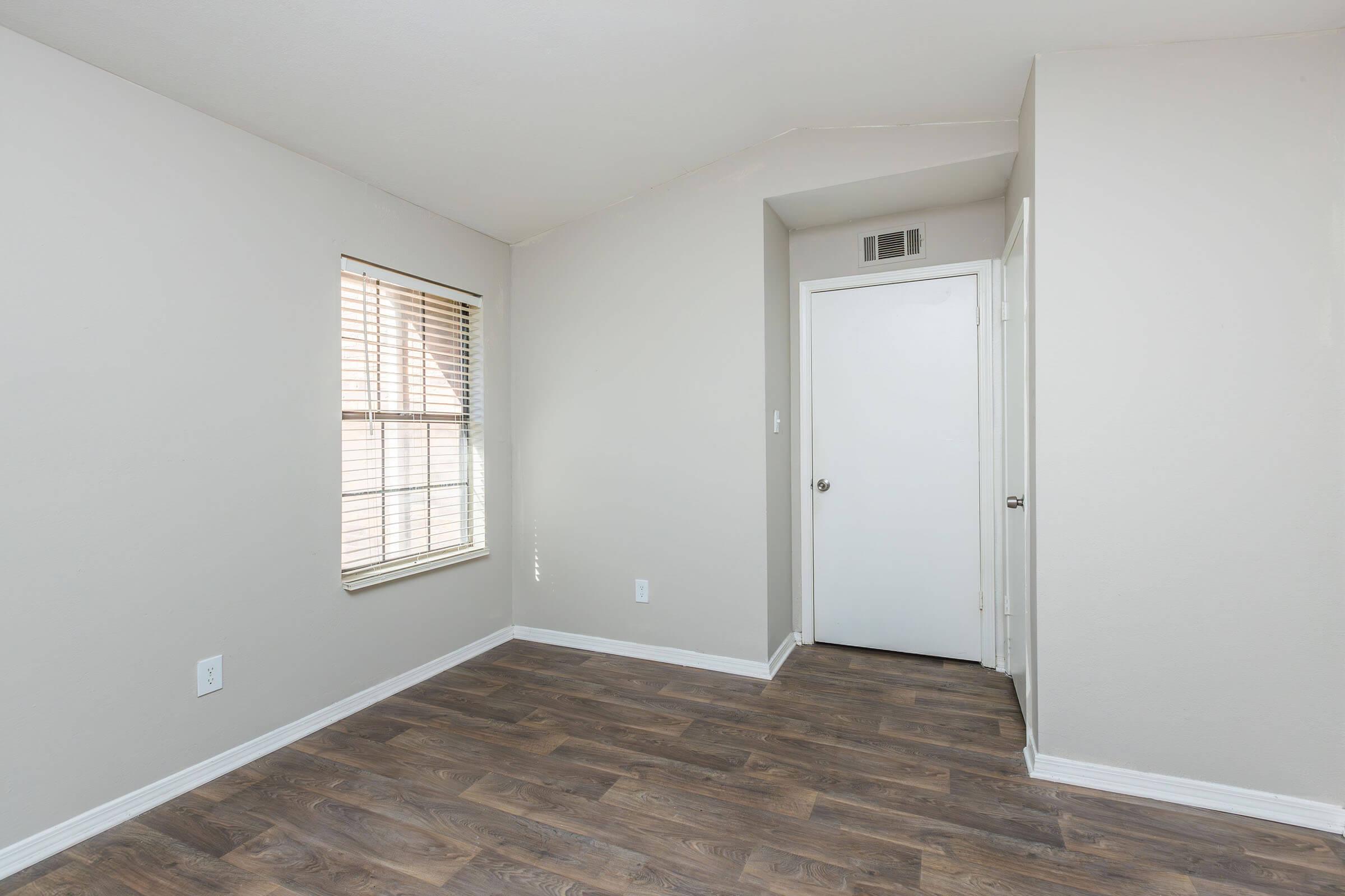 a room with a sink and a window