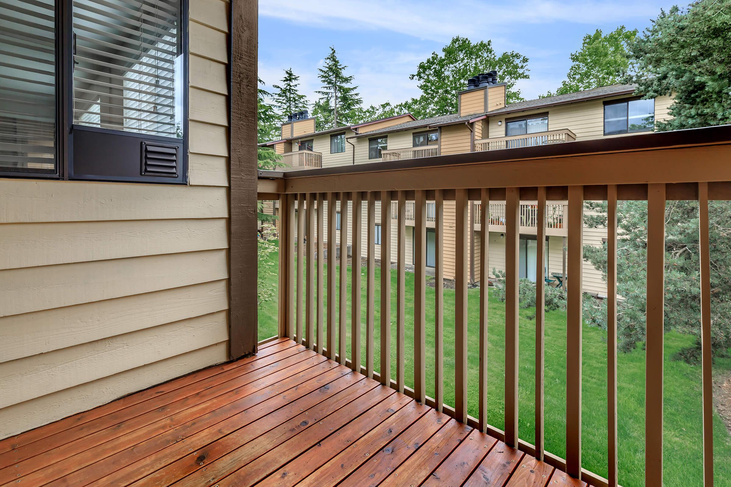a building with a wooden fence