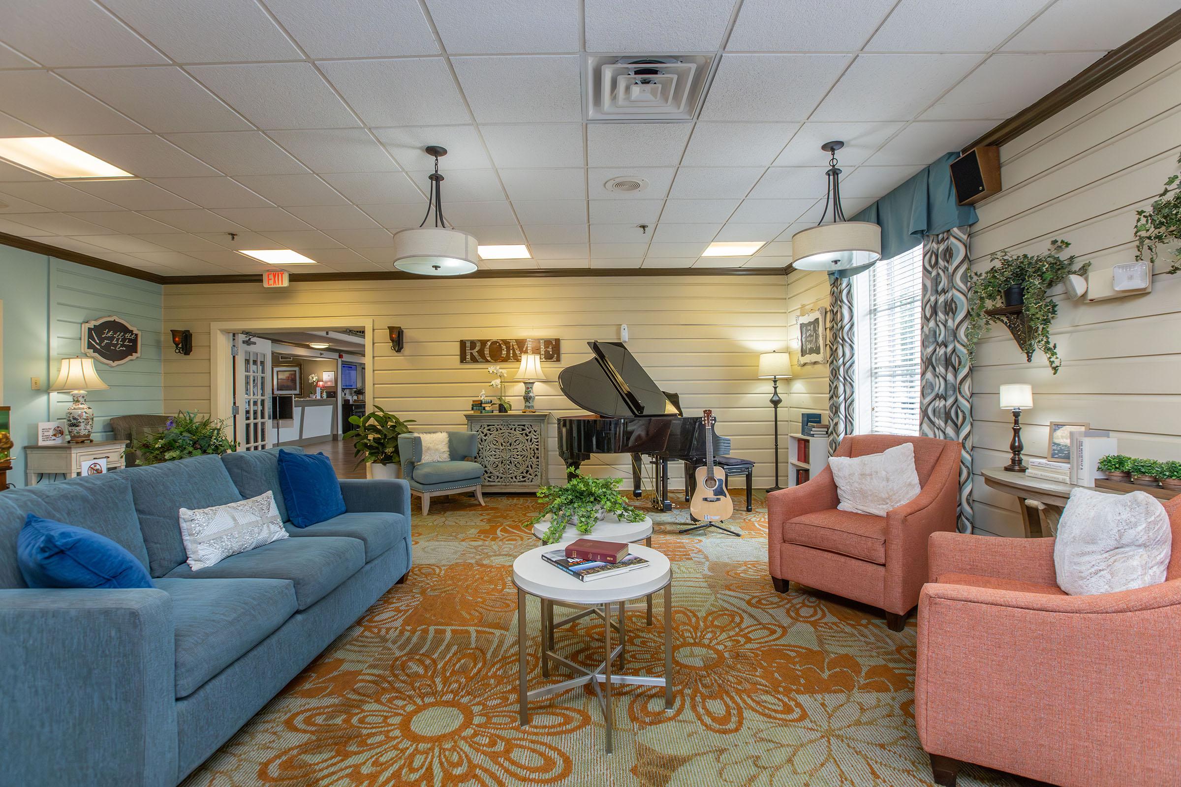 a living room filled with lots of furniture